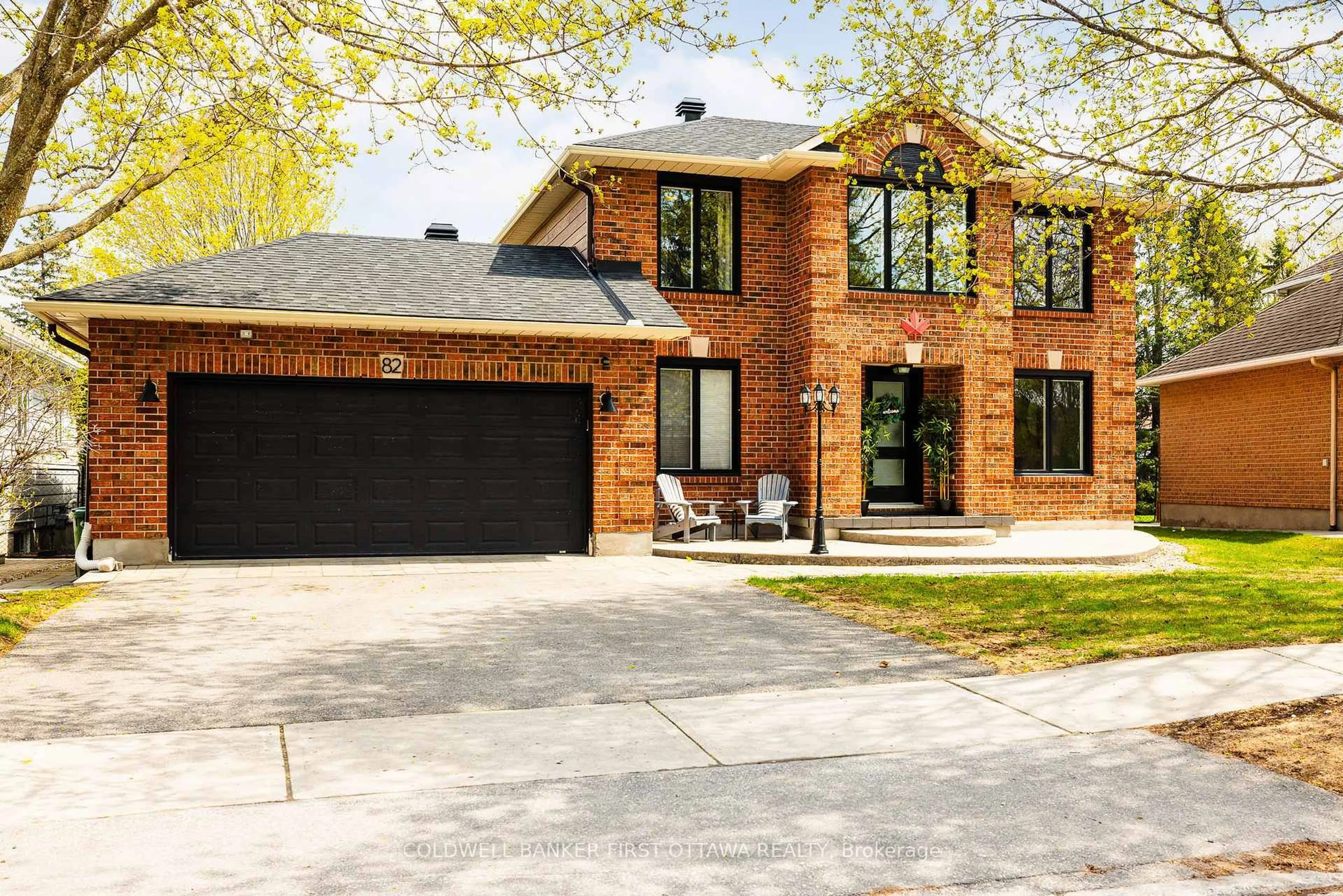 Home with brick exterior material, street for 82 Beechfern Dr, Stittsville Ontario K2S 1E3