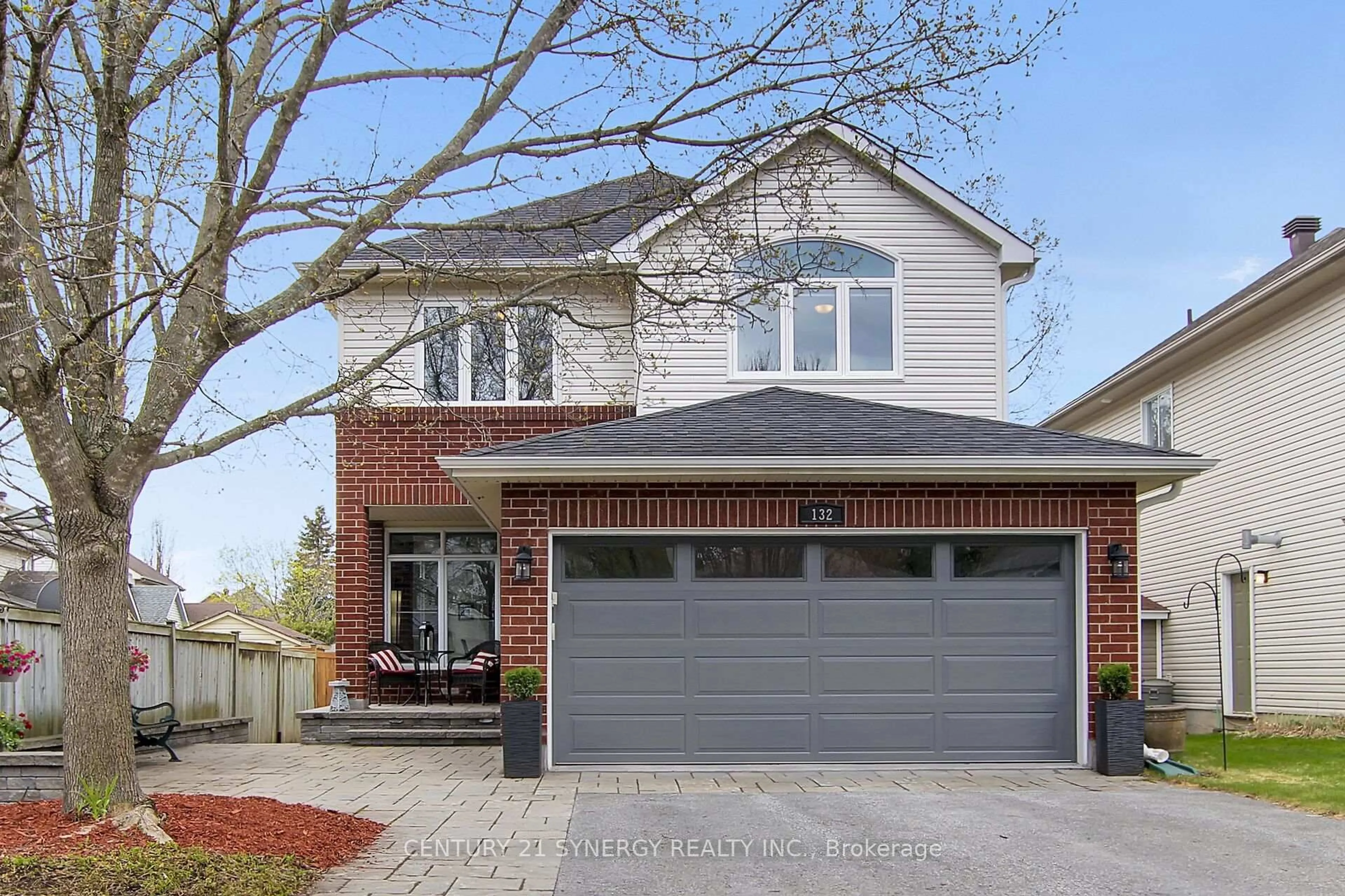 Home with brick exterior material, street for 132 Springcreek Cres, Ottawa Ontario K2M 2M1