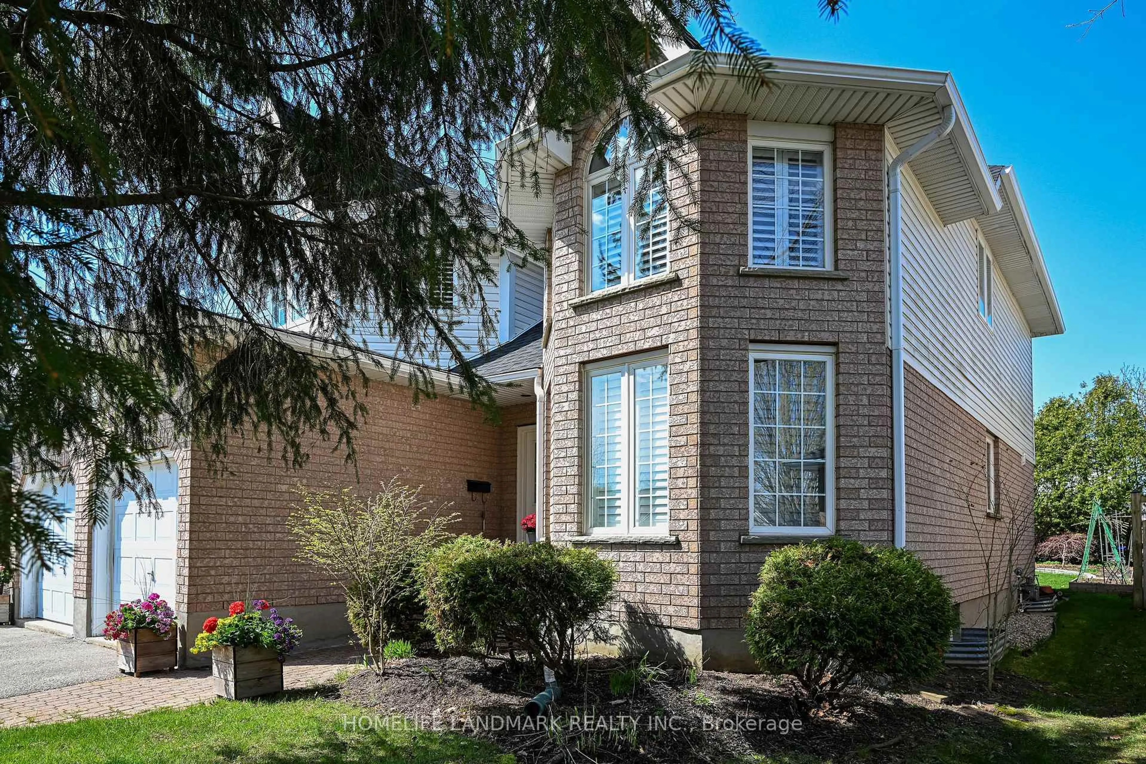 Home with brick exterior material, street for 98 Pheasant Run Dr, Guelph Ontario N1C 1E3