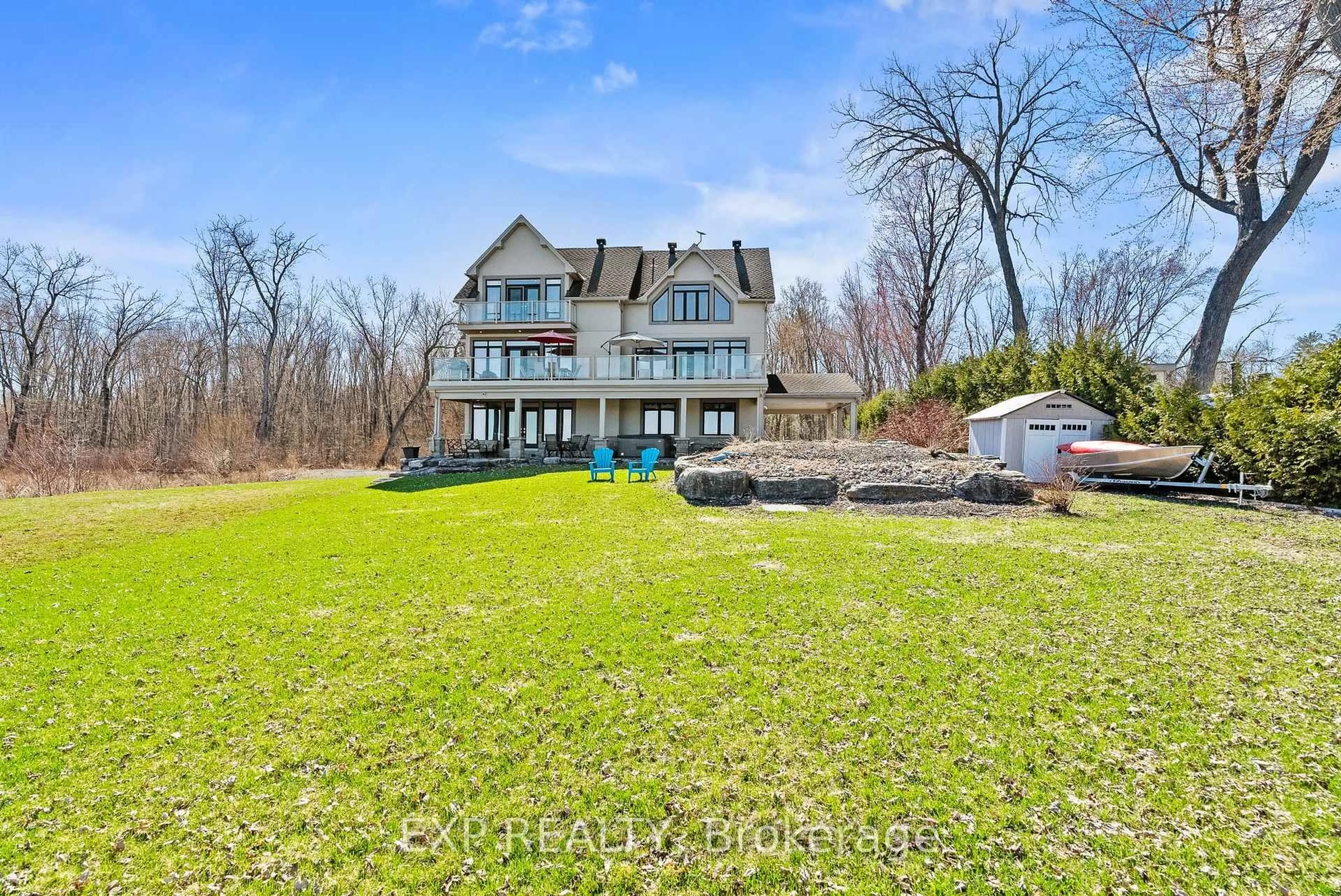 A pic from outside/outdoor area/front of a property/back of a property/a pic from drone, water/lake/river/ocean view for 102 Allbirch Rd, Ottawa Ontario K0A 3M0