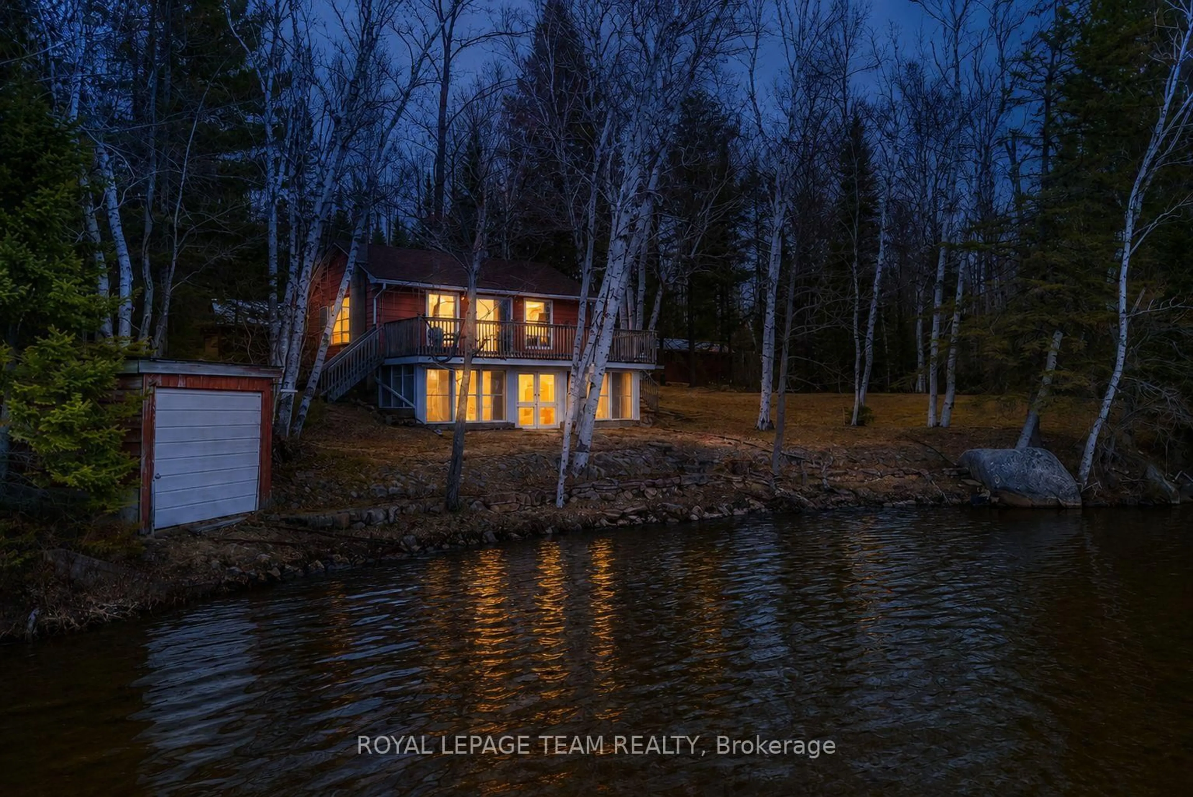 A pic from outside/outdoor area/front of a property/back of a property/a pic from drone, water/lake/river/ocean view for 9 Island Boat Launch Lane, Whitney Ontario K0J 2M0