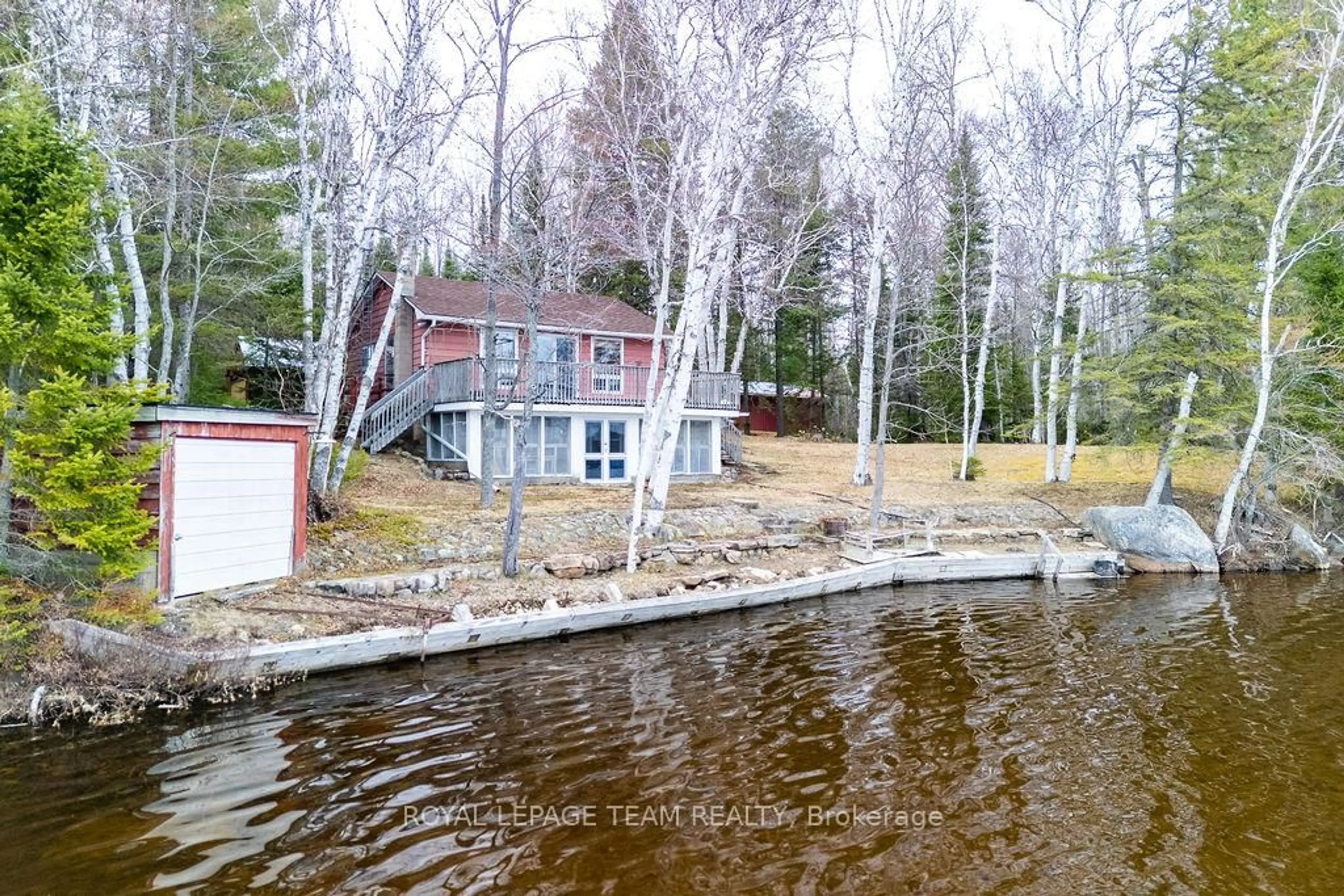 A pic from outside/outdoor area/front of a property/back of a property/a pic from drone, water/lake/river/ocean view for 9 Island Boat Launch Lane, Whitney Ontario K0J 2M0