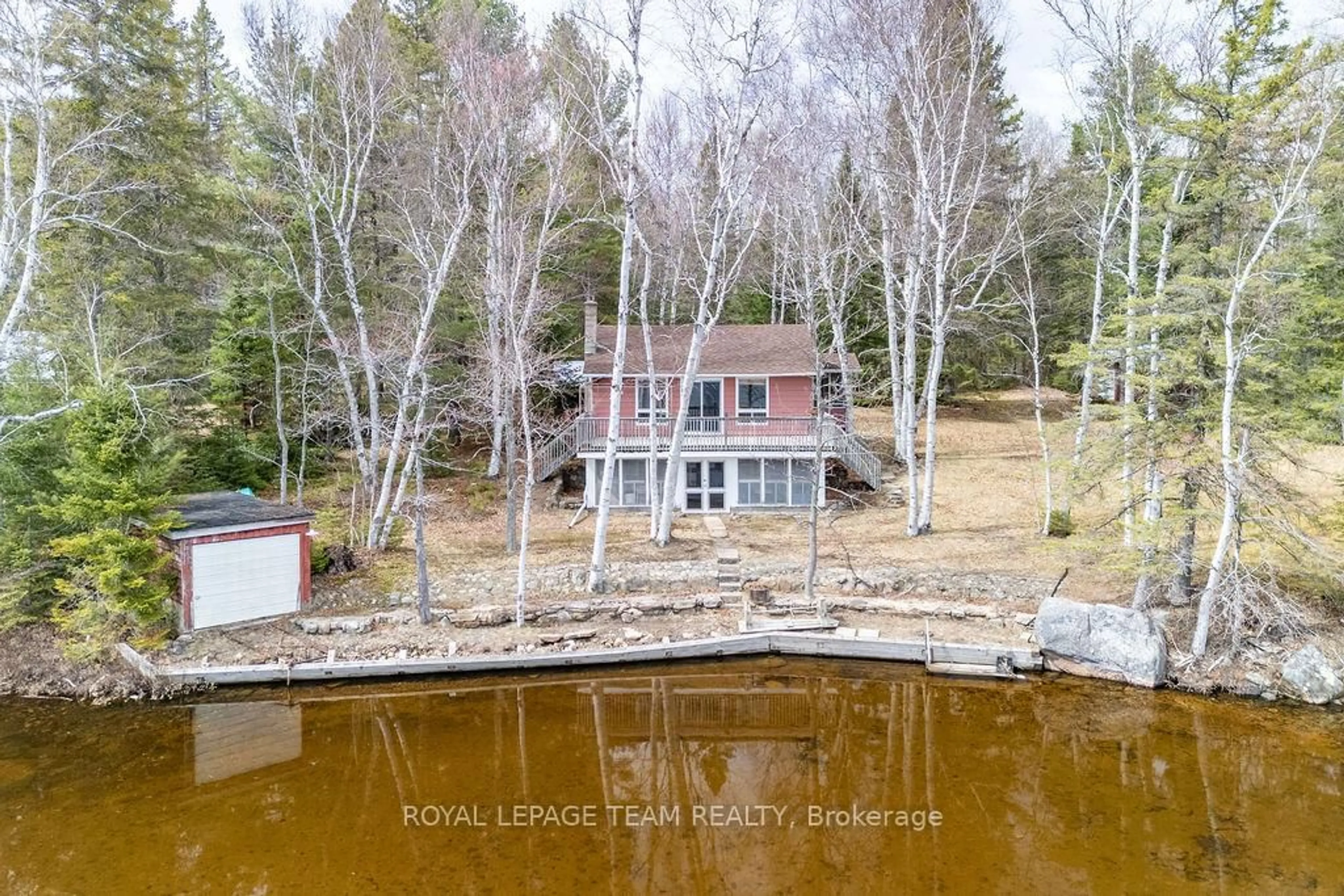 A pic from outside/outdoor area/front of a property/back of a property/a pic from drone, water/lake/river/ocean view for 9 Island Boat Launch Lane, Whitney Ontario K0J 2M0
