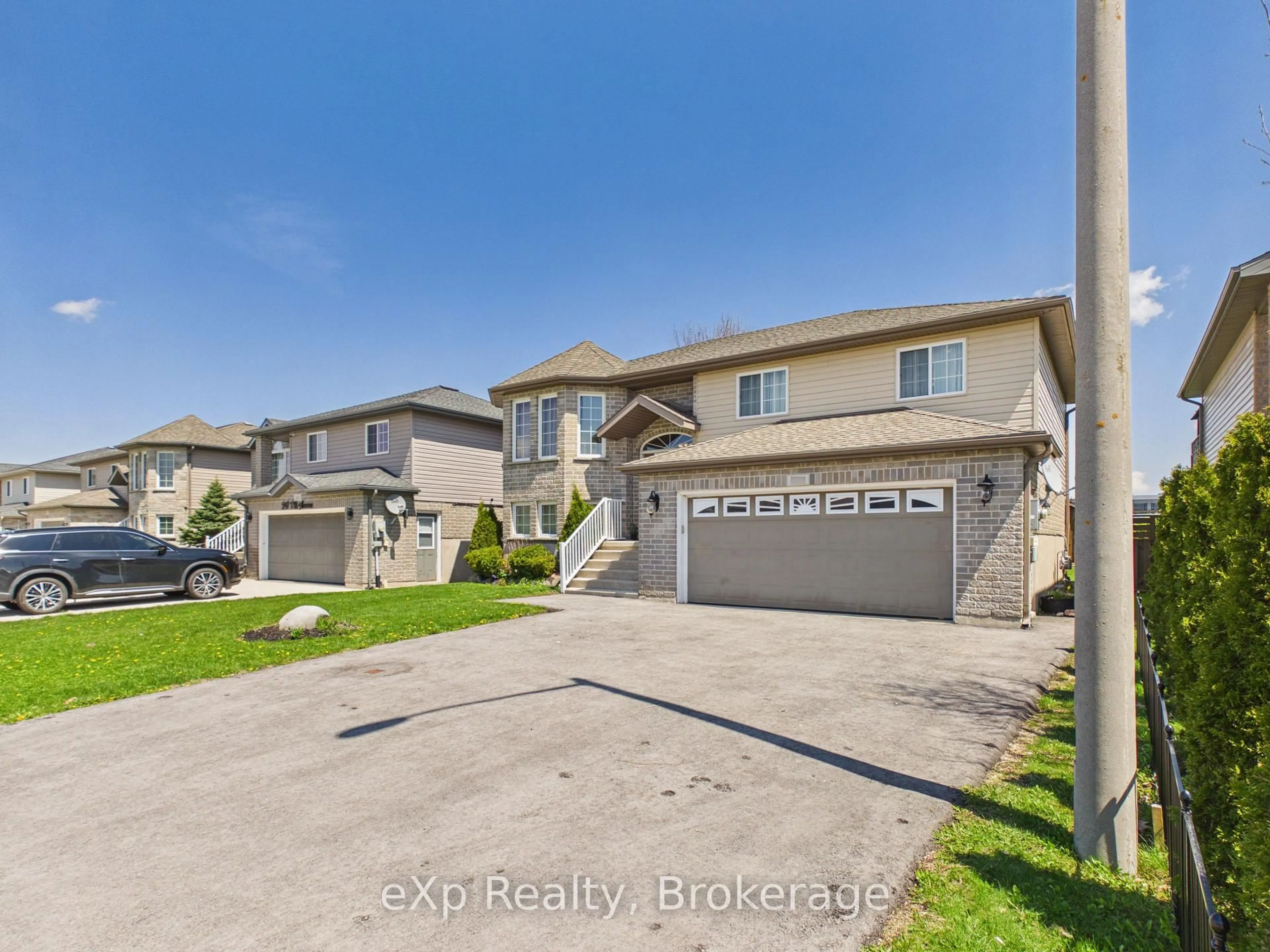 A pic from outside/outdoor area/front of a property/back of a property/a pic from drone, street for 241 17th Ave, Hanover Ontario N4N 3V4