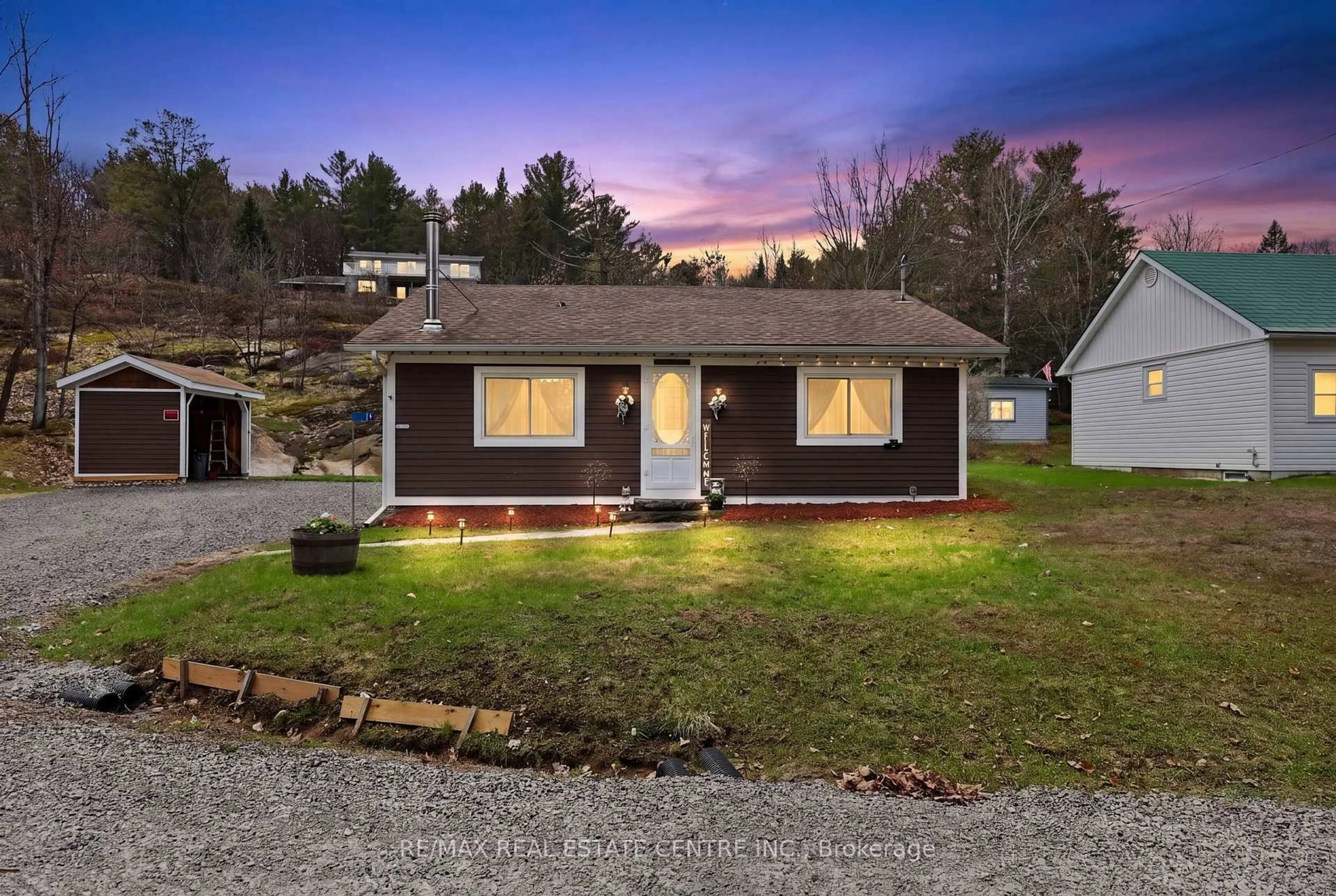 Home with vinyl exterior material, street for 17 MCCLURE Lane, Huntsville Ontario P0B 1L0