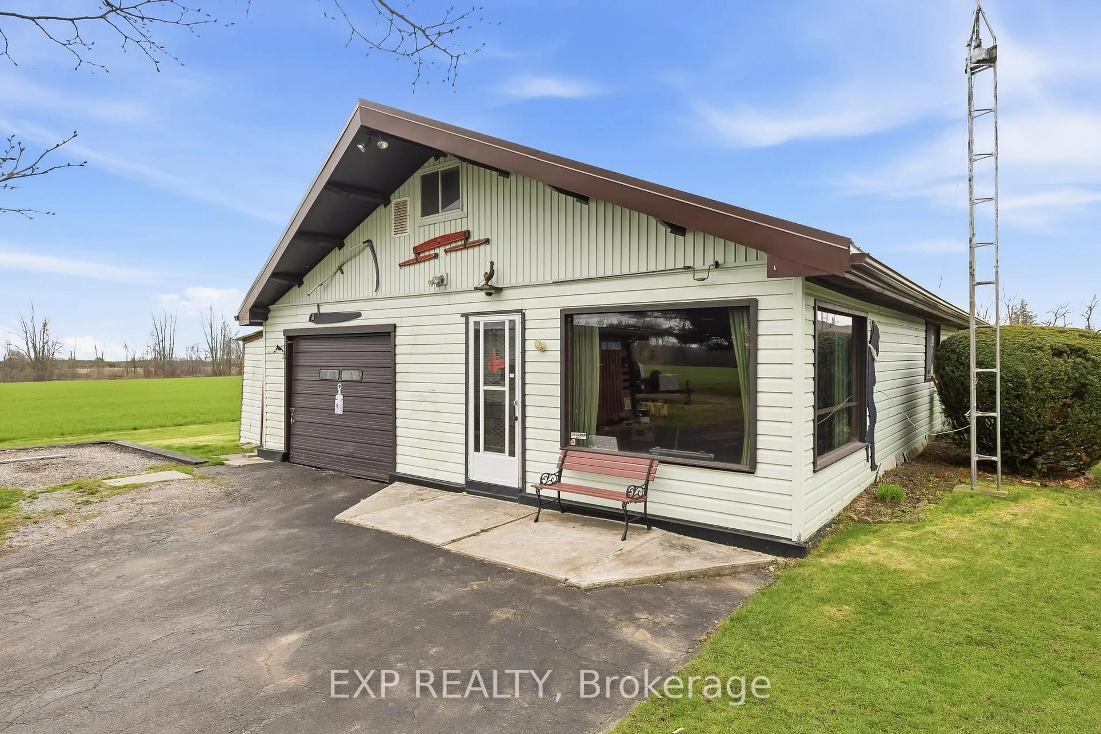 A pic from outside/outdoor area/front of a property/back of a property/a pic from drone, building for 7411 County Rd 2, Hamilton Township Ontario K9A 4J7