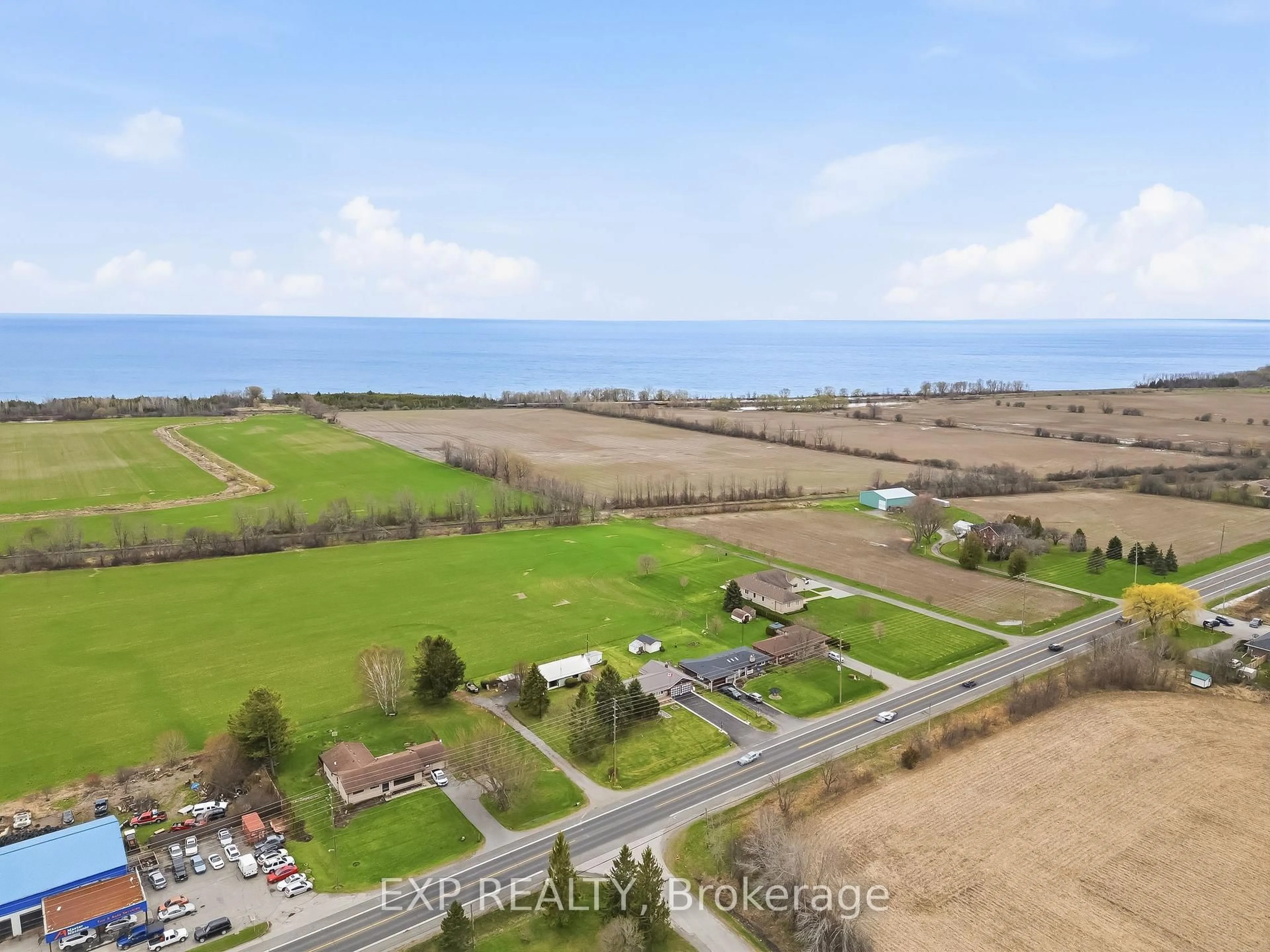 A pic from outside/outdoor area/front of a property/back of a property/a pic from drone, water/lake/river/ocean view for 7411 County Rd 2, Hamilton Township Ontario K9A 4J7