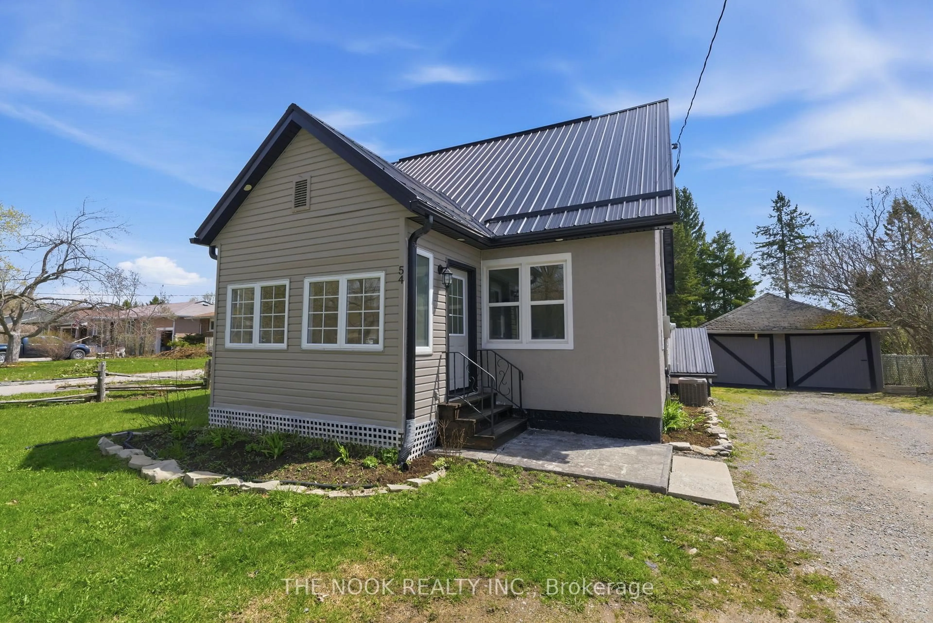 A pic from outside/outdoor area/front of a property/back of a property/a pic from drone, building for 54 Clifton St, Kawartha Lakes Ontario K0M 1N0