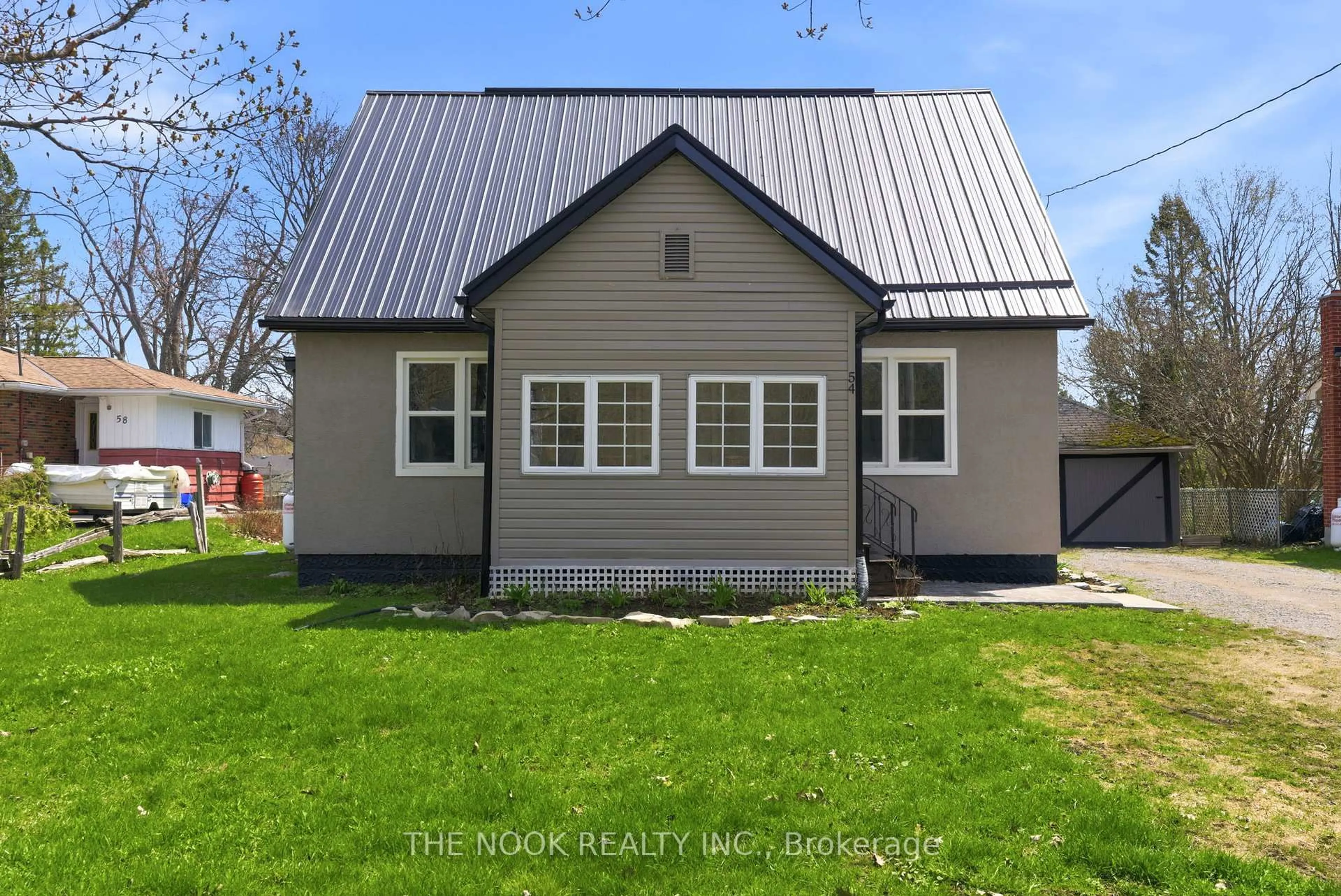 Home with vinyl exterior material, building for 54 Clifton St, Kawartha Lakes Ontario K0M 1N0