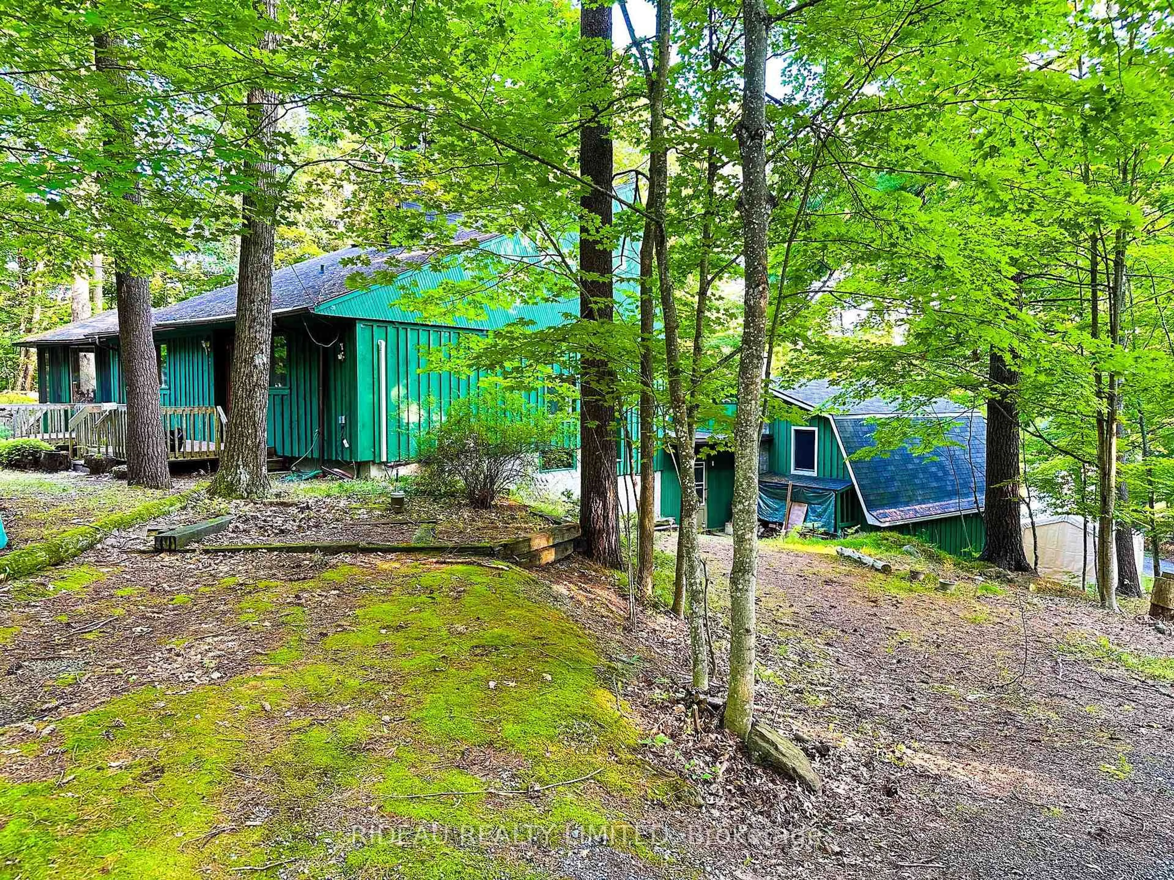A pic from outside/outdoor area/front of a property/back of a property/a pic from drone, forest/trees view for 21 Fox Ru, Rideau Lakes Ontario K0G 1E0