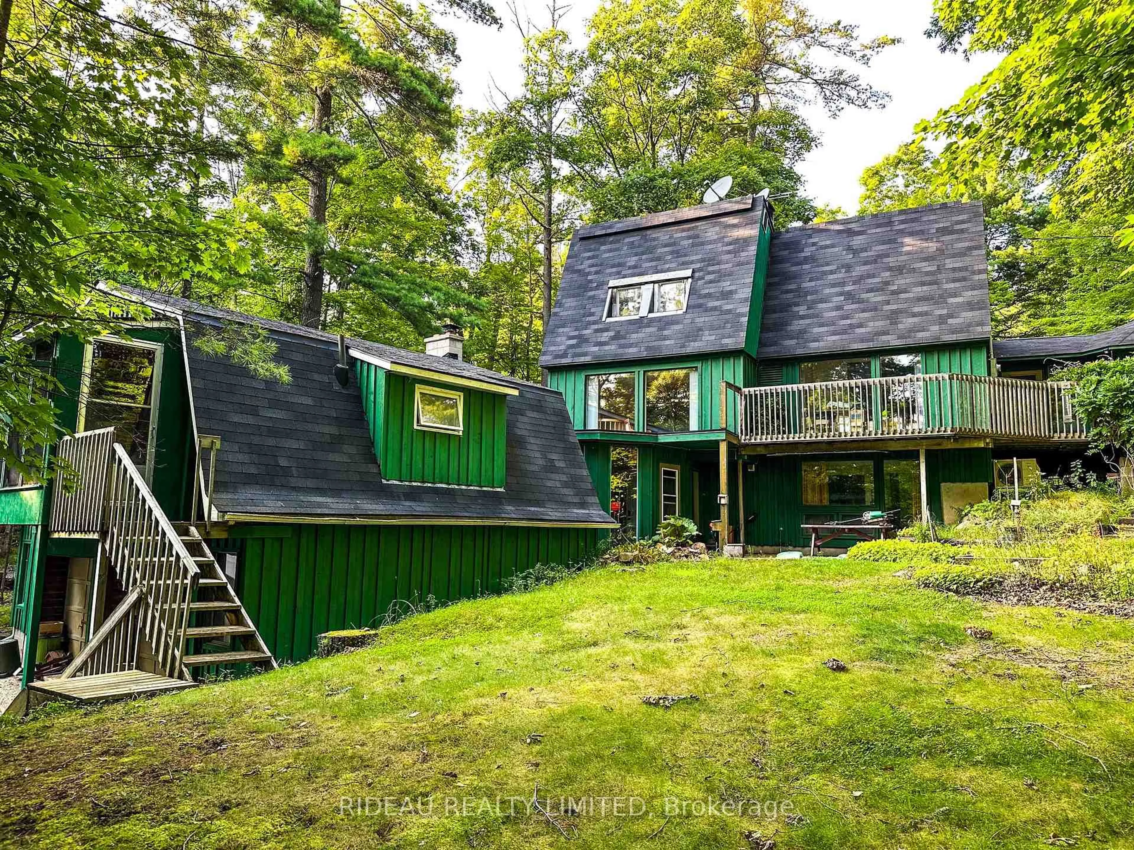 Home with vinyl exterior material, forest/trees view for 21 Fox Ru, Rideau Lakes Ontario K0G 1E0