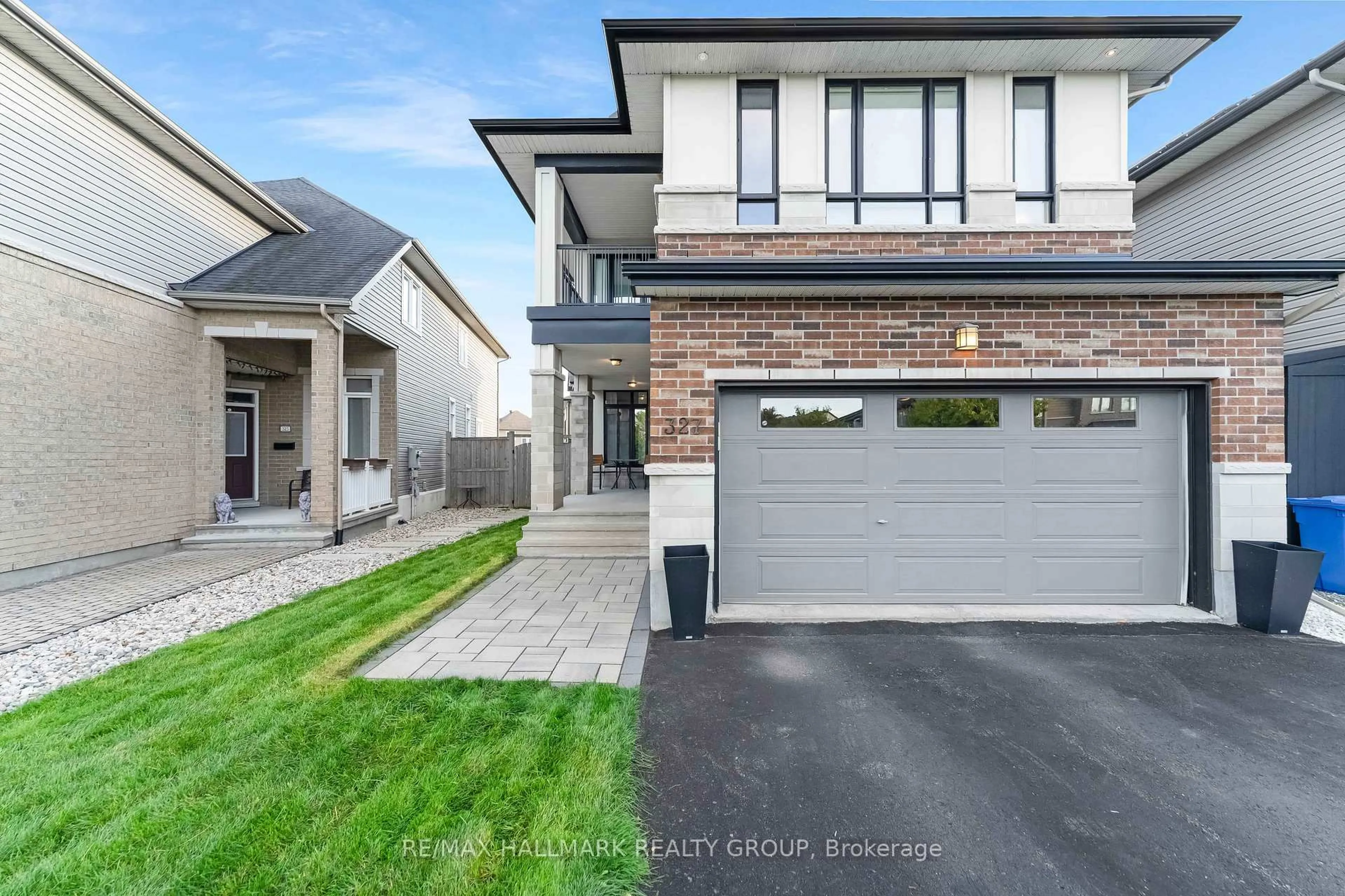 Home with brick exterior material, street for 327 BALLINVILLE Circ, Ottawa Ontario K4M 0C4