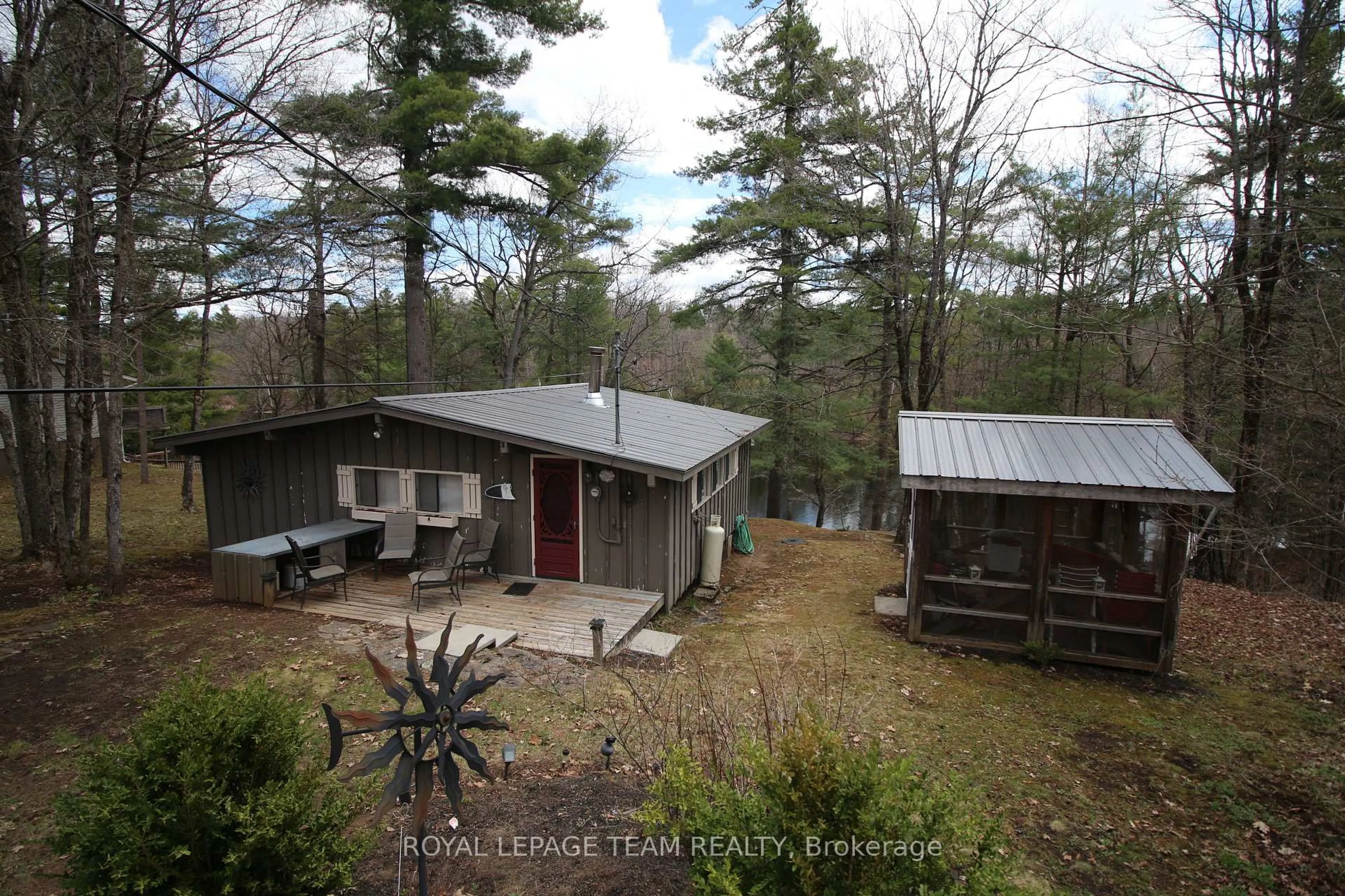 A pic from outside/outdoor area/front of a property/back of a property/a pic from drone, forest/trees view for 315 Silvery Lane, Tay Valley Ontario K0G 2B0