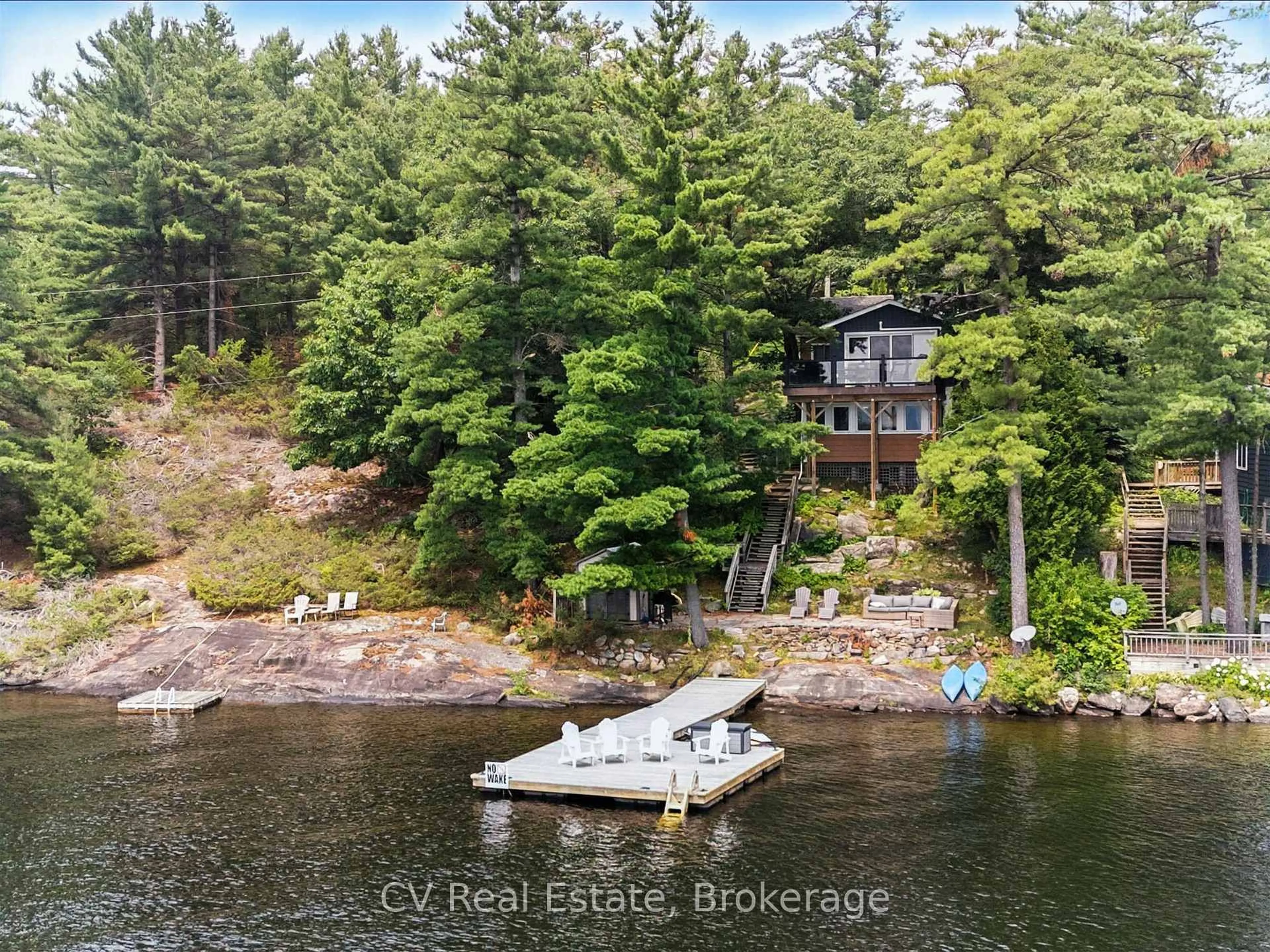 A pic from outside/outdoor area/front of a property/back of a property/a pic from drone, water/lake/river/ocean view for 1166 Parkers Point Rd, Gravenhurst Ontario P1P 1R2