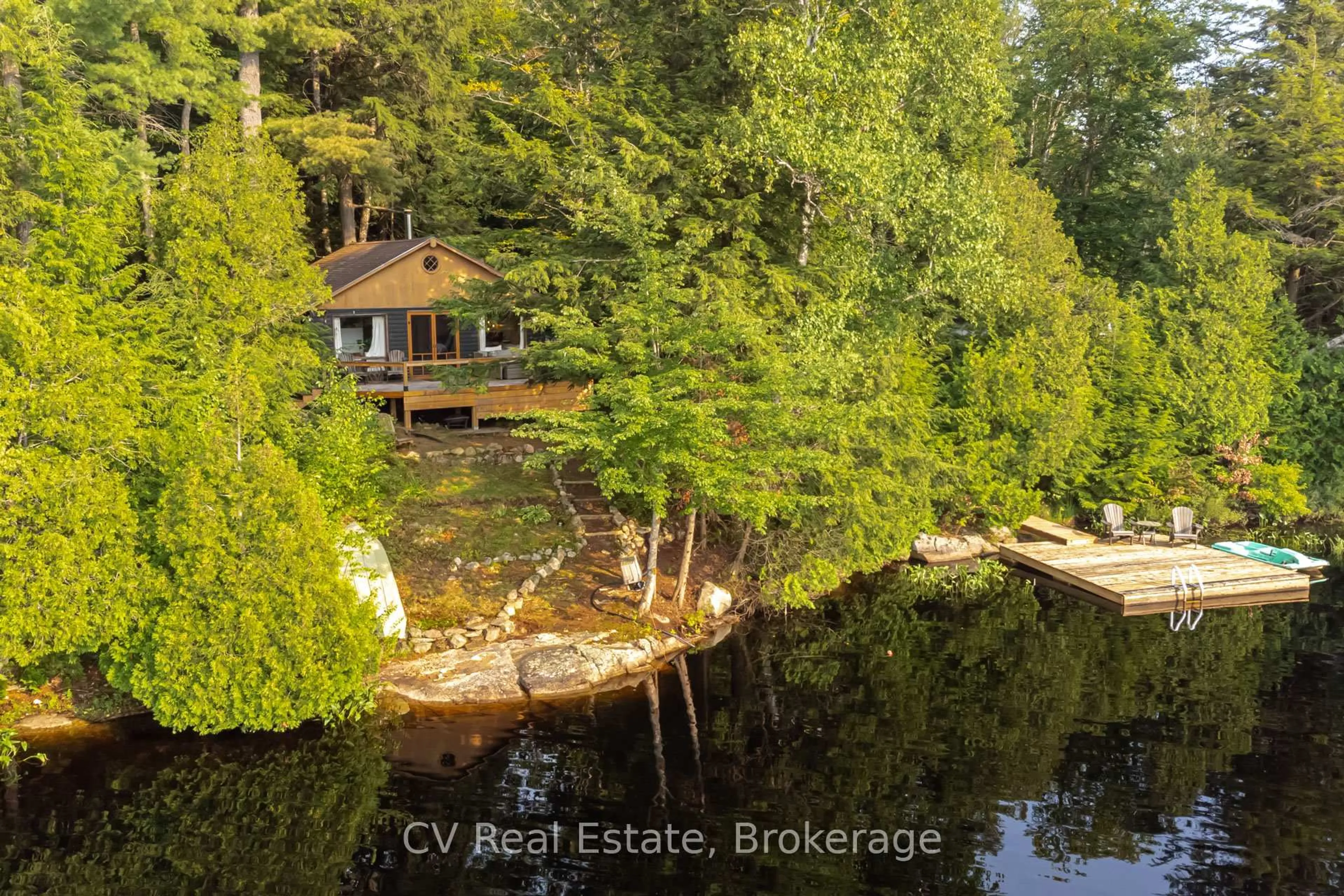 A pic from outside/outdoor area/front of a property/back of a property/a pic from drone, water/lake/river/ocean view for 1027 North Pine Dr, Lake of Bays Ontario P0A 1E0