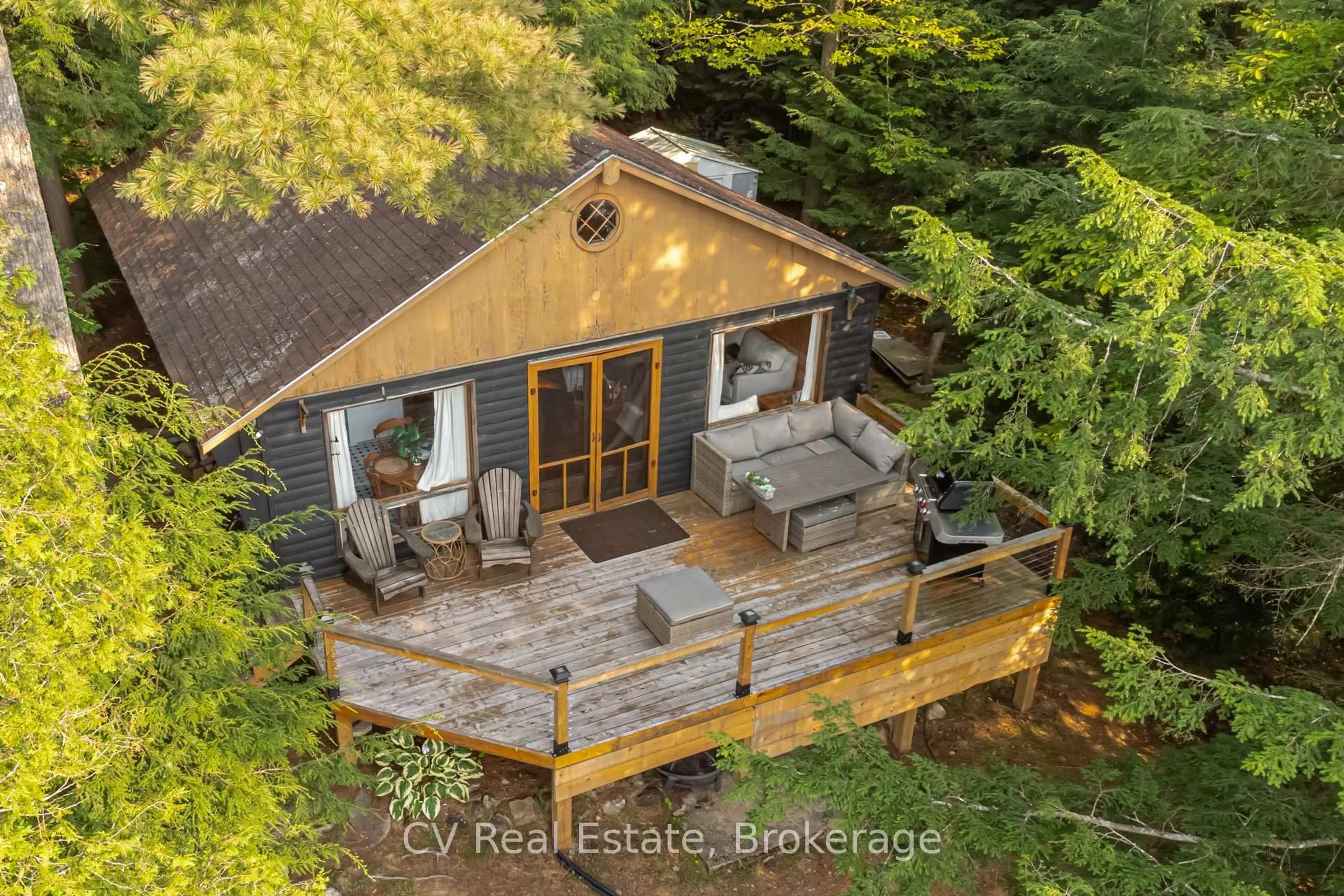 A pic from outside/outdoor area/front of a property/back of a property/a pic from drone, water/lake/river/ocean view for 1027 North Pine Dr, Lake of Bays Ontario P0A 1E0