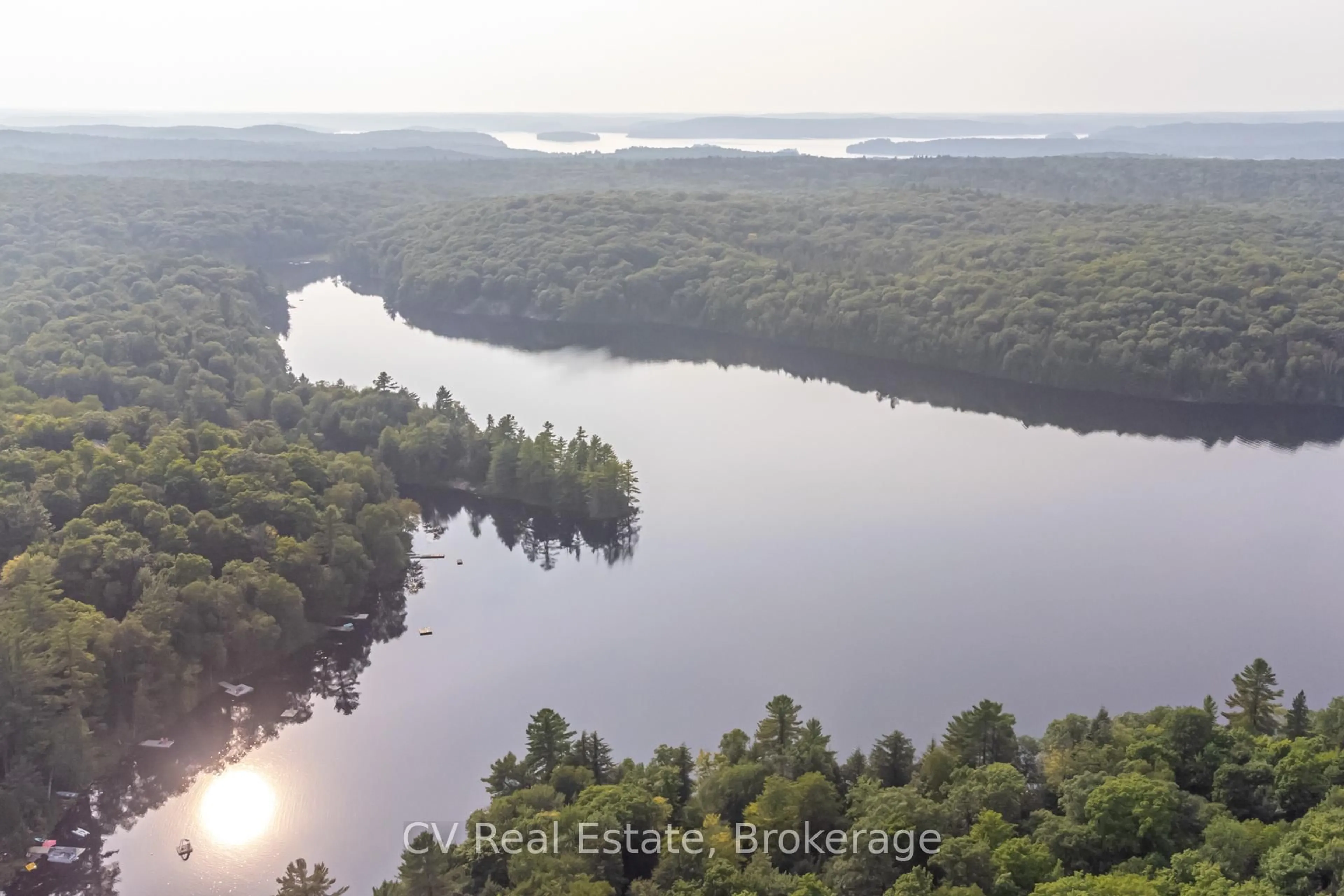 A pic from outside/outdoor area/front of a property/back of a property/a pic from drone, water/lake/river/ocean view for 1027 North Pine Dr, Lake of Bays Ontario P0A 1E0