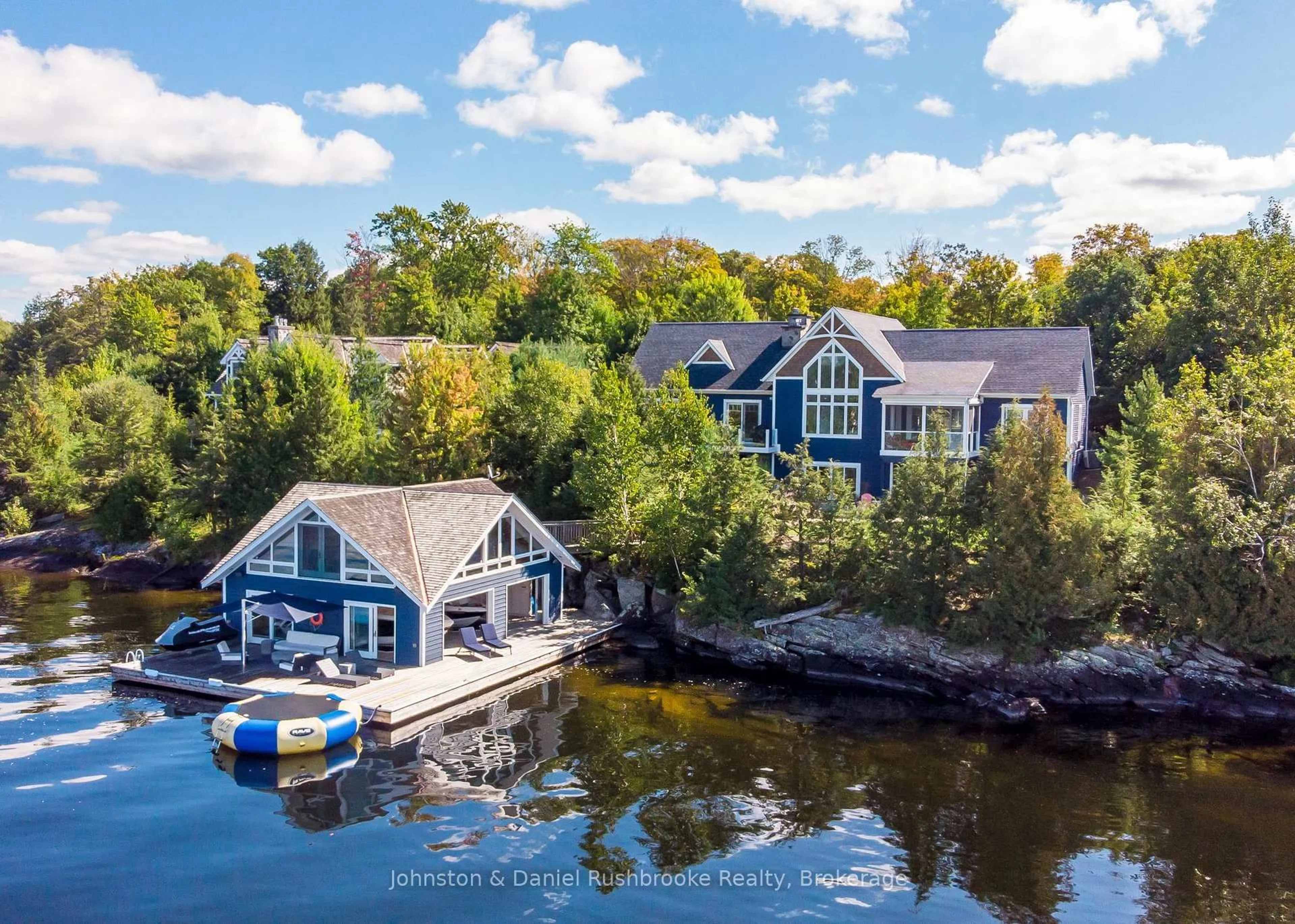 A pic from outside/outdoor area/front of a property/back of a property/a pic from drone, water/lake/river/ocean view for 2-1350 Stephens Bay Rd, Bracebridge Ontario P1L 1X2