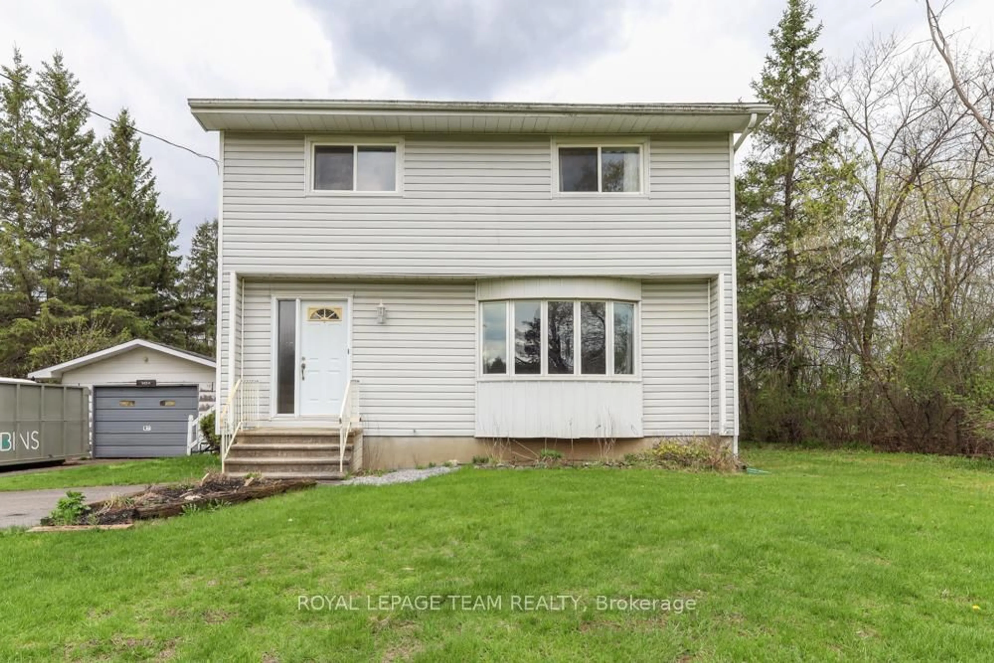 Home with vinyl exterior material, street for 1454 Stagecoach Rd, Ottawa Ontario K4P 1G1
