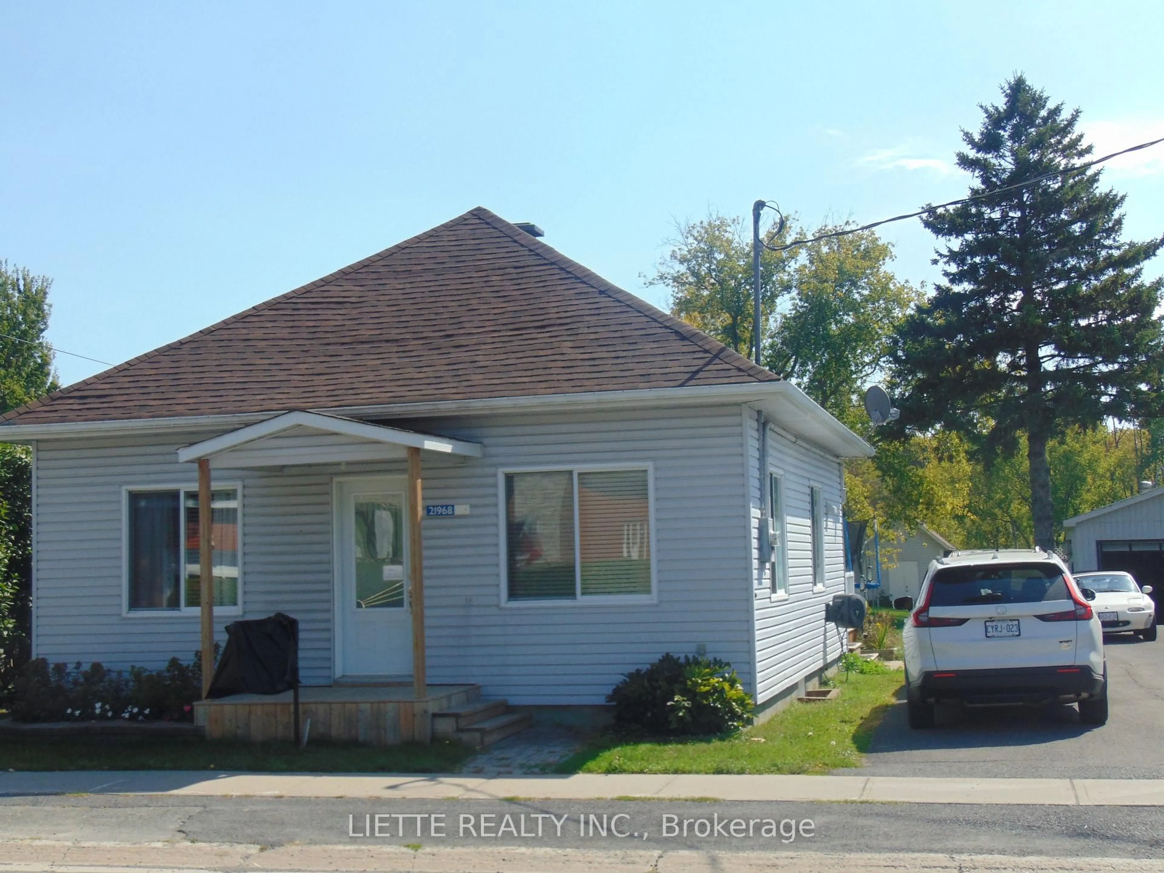 Home with vinyl exterior material, street for 21968 Main St, North Glengarry Ontario K0B 1H0