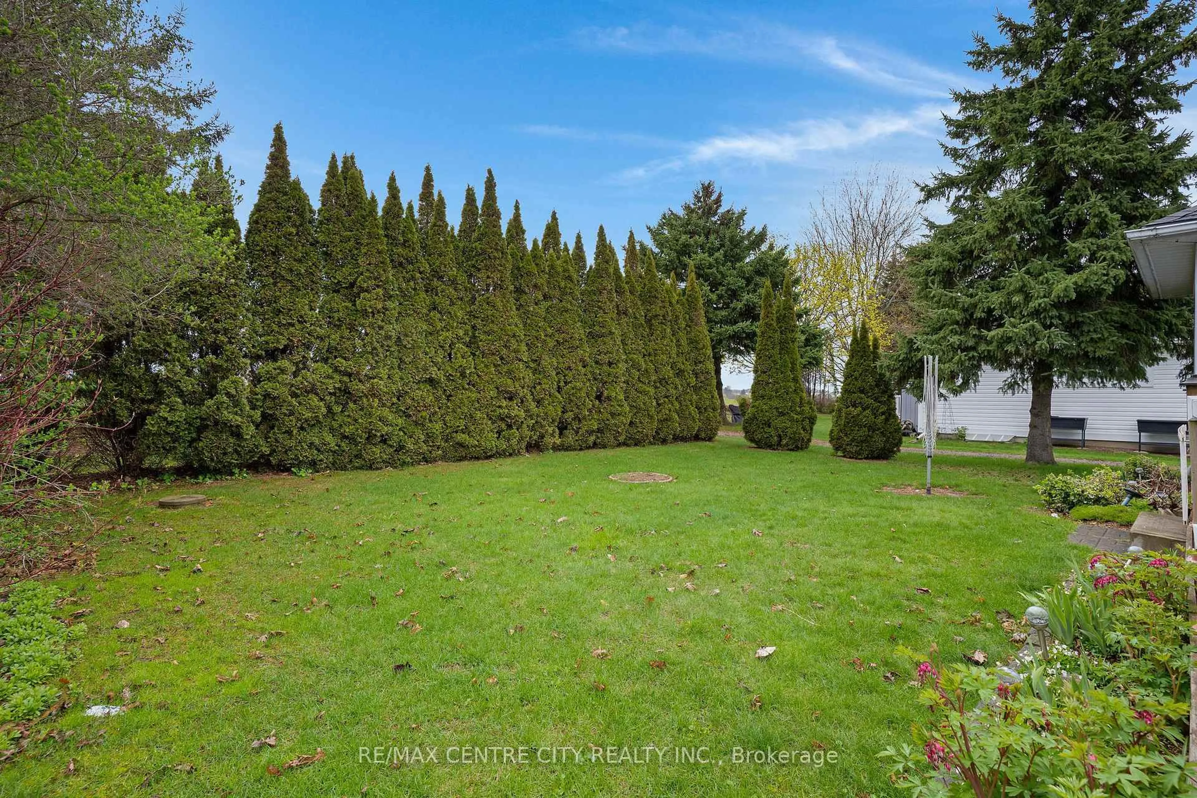 A pic from outside/outdoor area/front of a property/back of a property/a pic from drone, forest/trees view for 9 Lakefield Crt #89, Wilmot Ontario N3A 3P4
