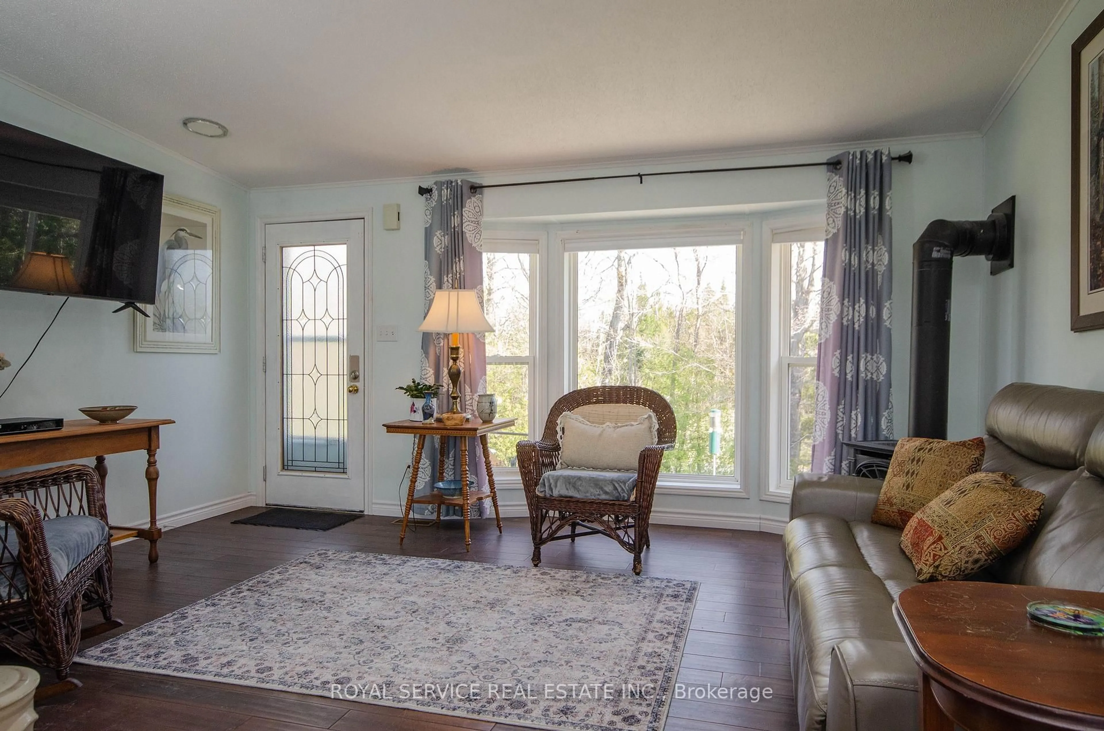 Living room with furniture, wood/laminate floor for 1206 Centre Line, Asphodel-Norwood Ontario K0L 2V0