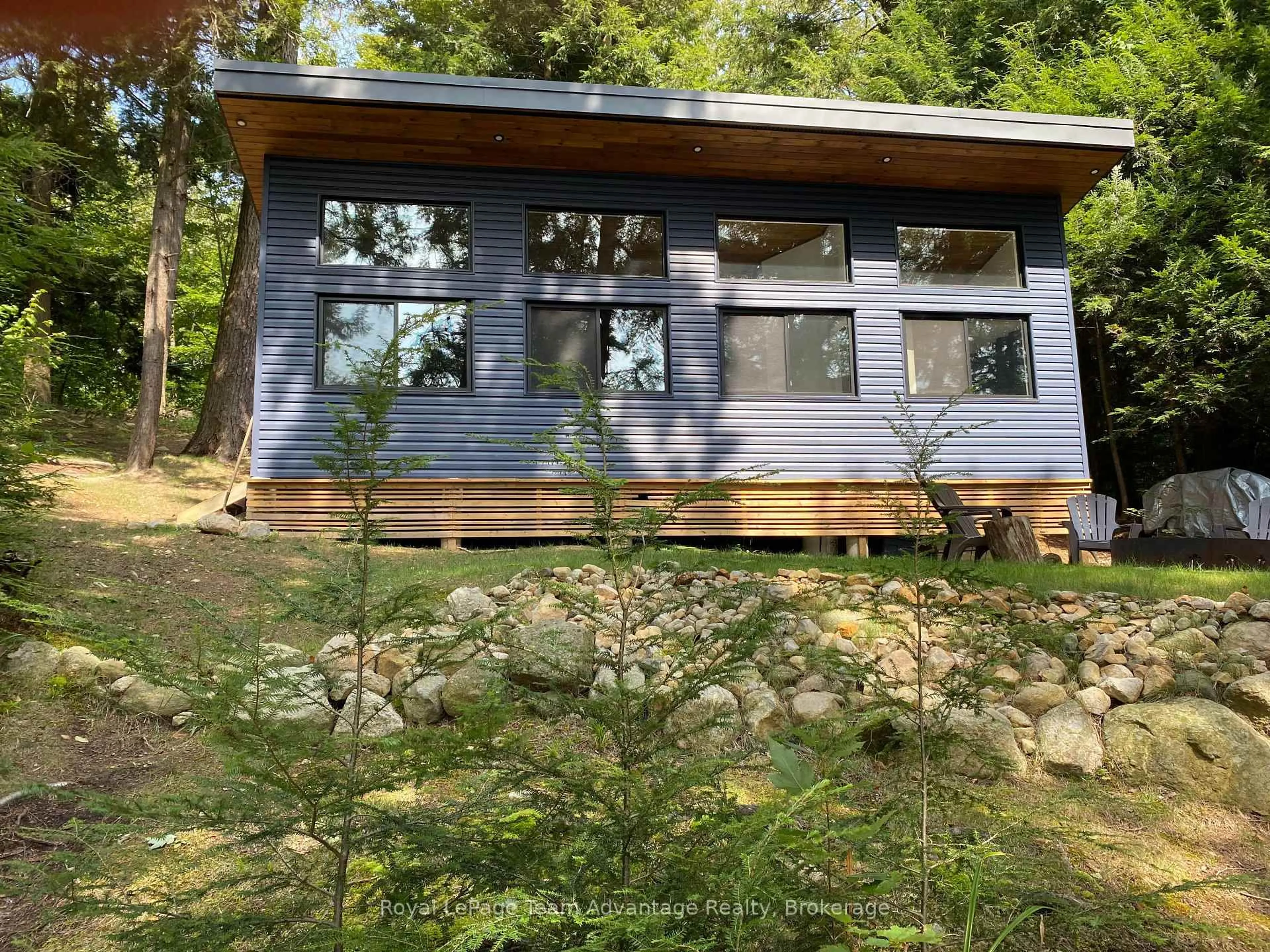 Home with vinyl exterior material, forest/trees view for 236 Otter Lake, Fr# 4 Rd #6, Seguin Ontario P2A 2W8