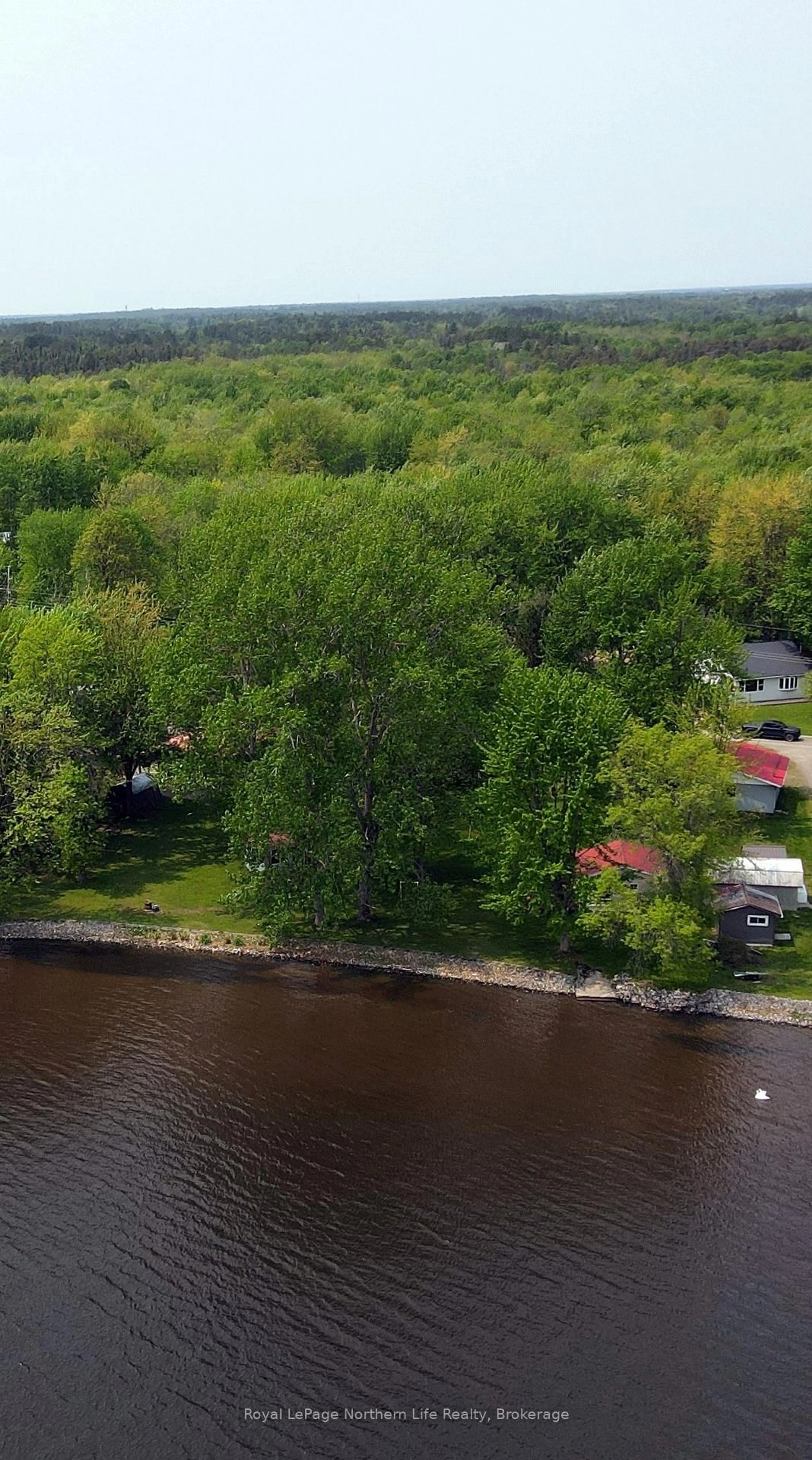 A pic from outside/outdoor area/front of a property/back of a property/a pic from drone, water/lake/river/ocean view for 16 Comeau Rd, West Nipissing Ontario P0H 2M0