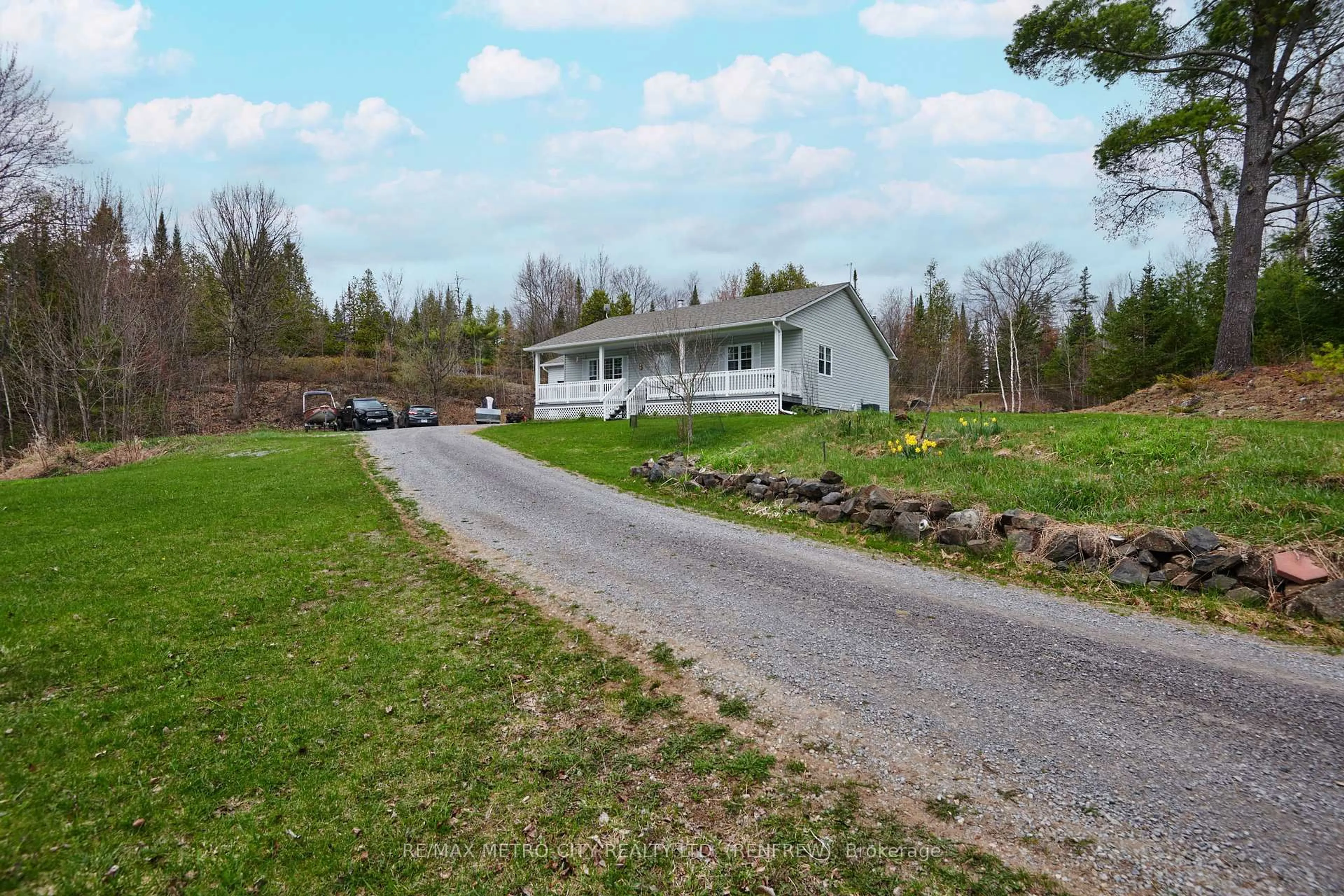 A pic from outside/outdoor area/front of a property/back of a property/a pic from drone, unknown for 1003 Grant Rd, Renfrew Ontario K7V 3Z9