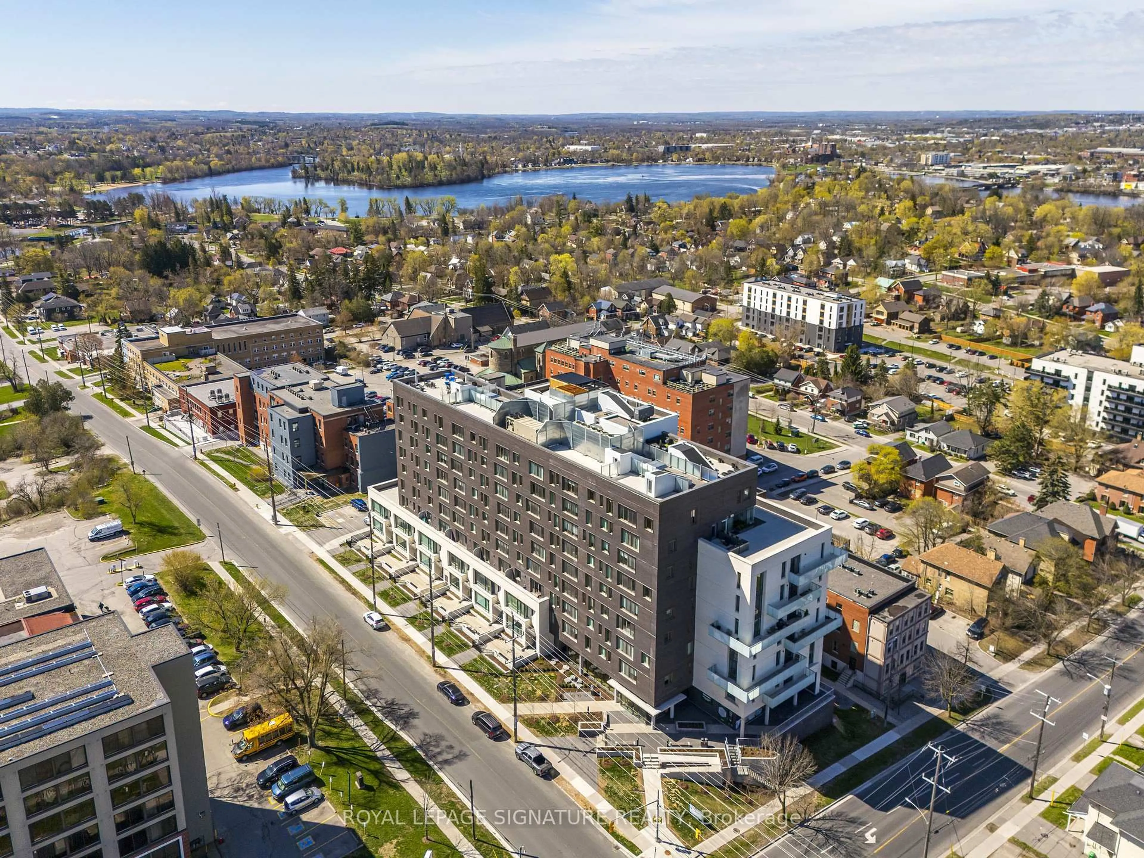 A pic from outside/outdoor area/front of a property/back of a property/a pic from drone, water/lake/river/ocean view for 195 Hunter St #412, Peterborough Ontario K9H 1G9