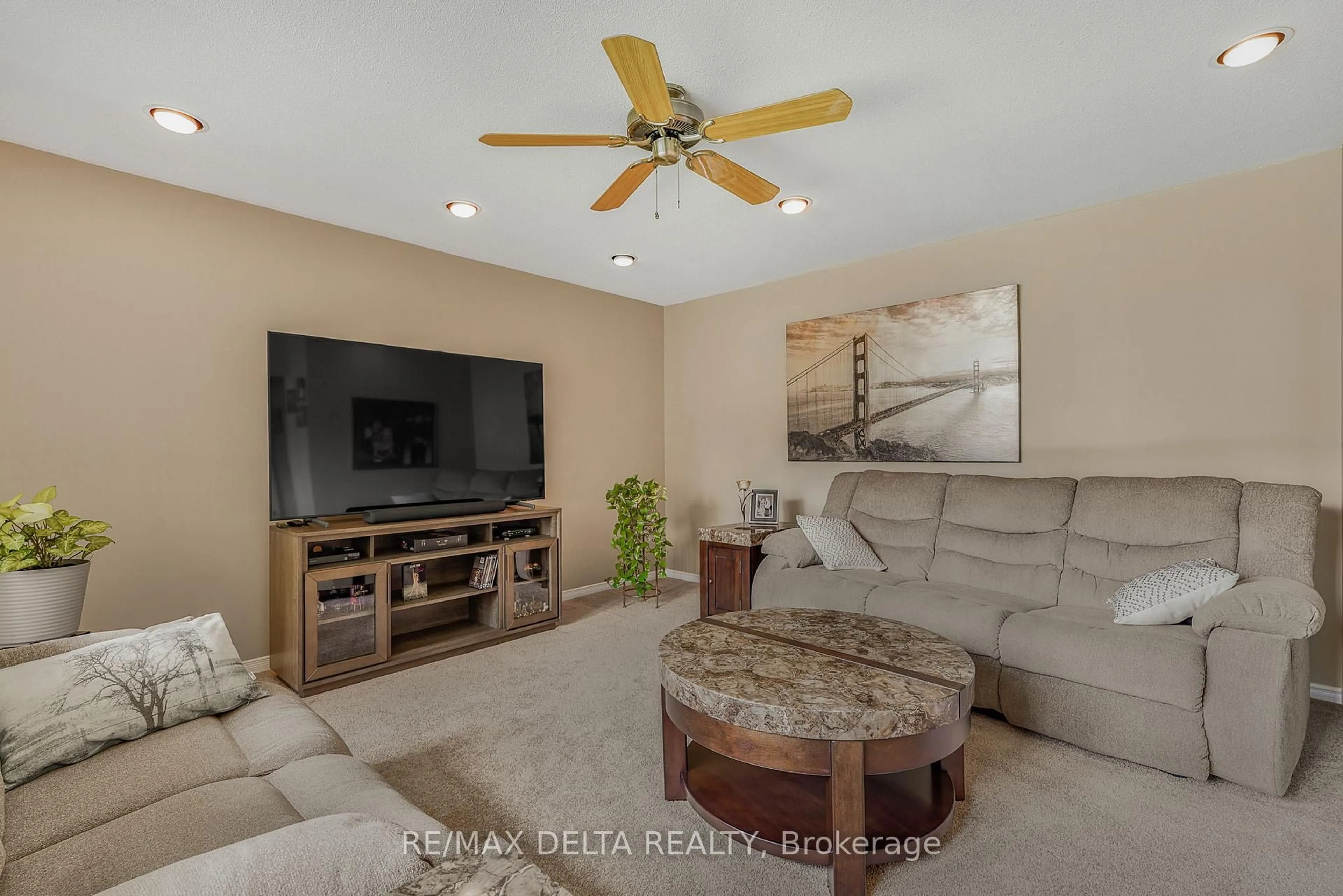 Living room with furniture, ceramic/tile floor for 1425 Boyer Rd, Ottawa Ontario K1C 1P9
