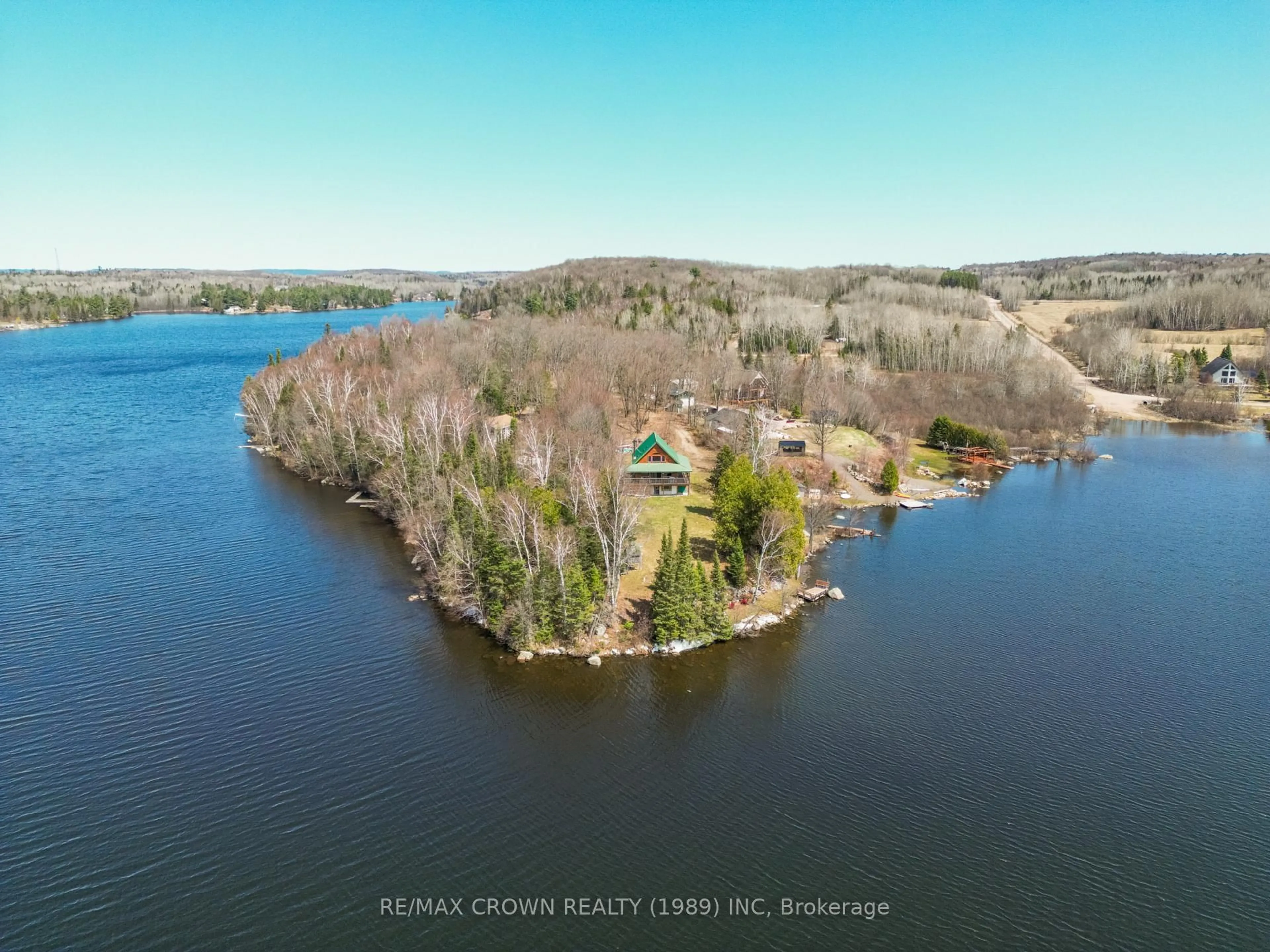 A pic from outside/outdoor area/front of a property/back of a property/a pic from drone, water/lake/river/ocean view for 102 North Star Dr, Bonfield Ontario P0H 1E0