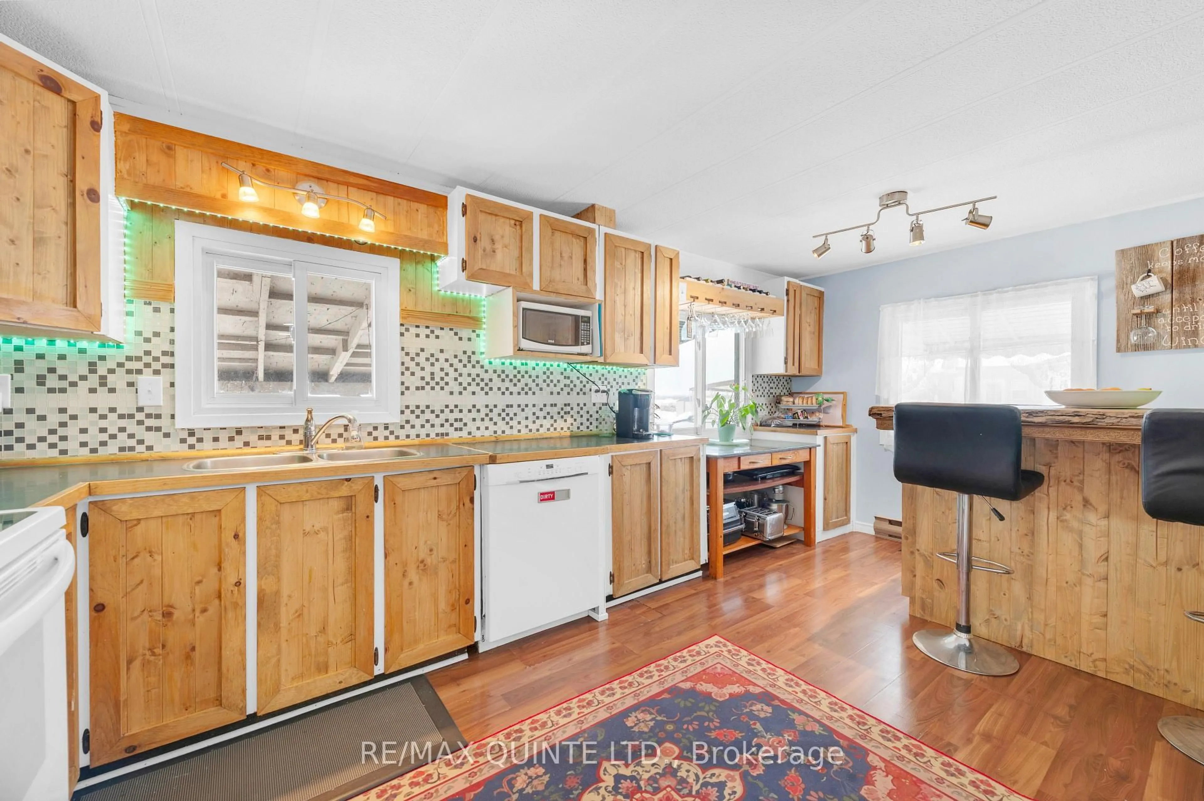 Open concept kitchen, ceramic/tile floor for 311 Dundas St #56, Quinte West Ontario K8V 1M1
