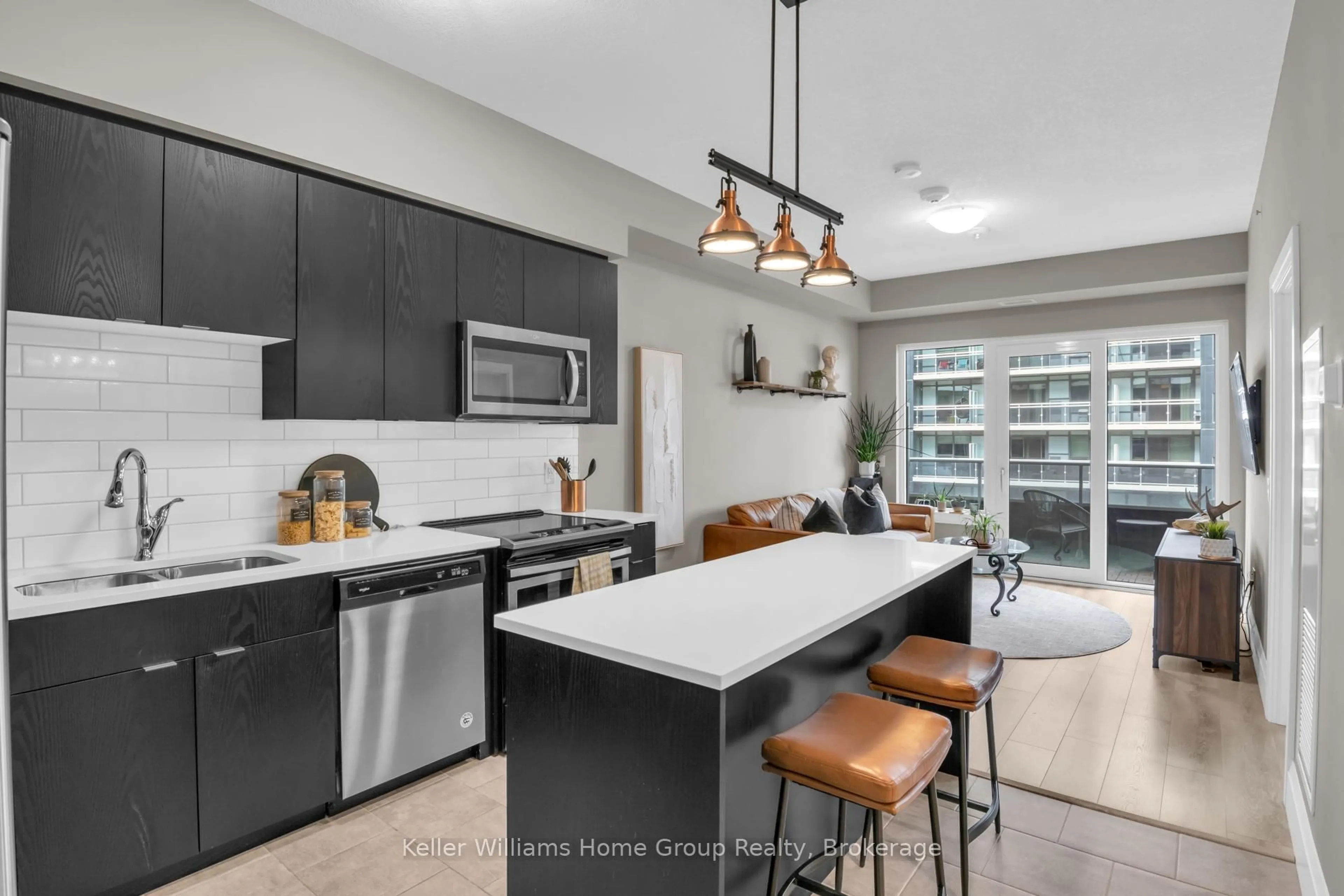 Open concept kitchen, ceramic/tile floor for 73 Arthur St #515, Guelph Ontario N1E 0S6