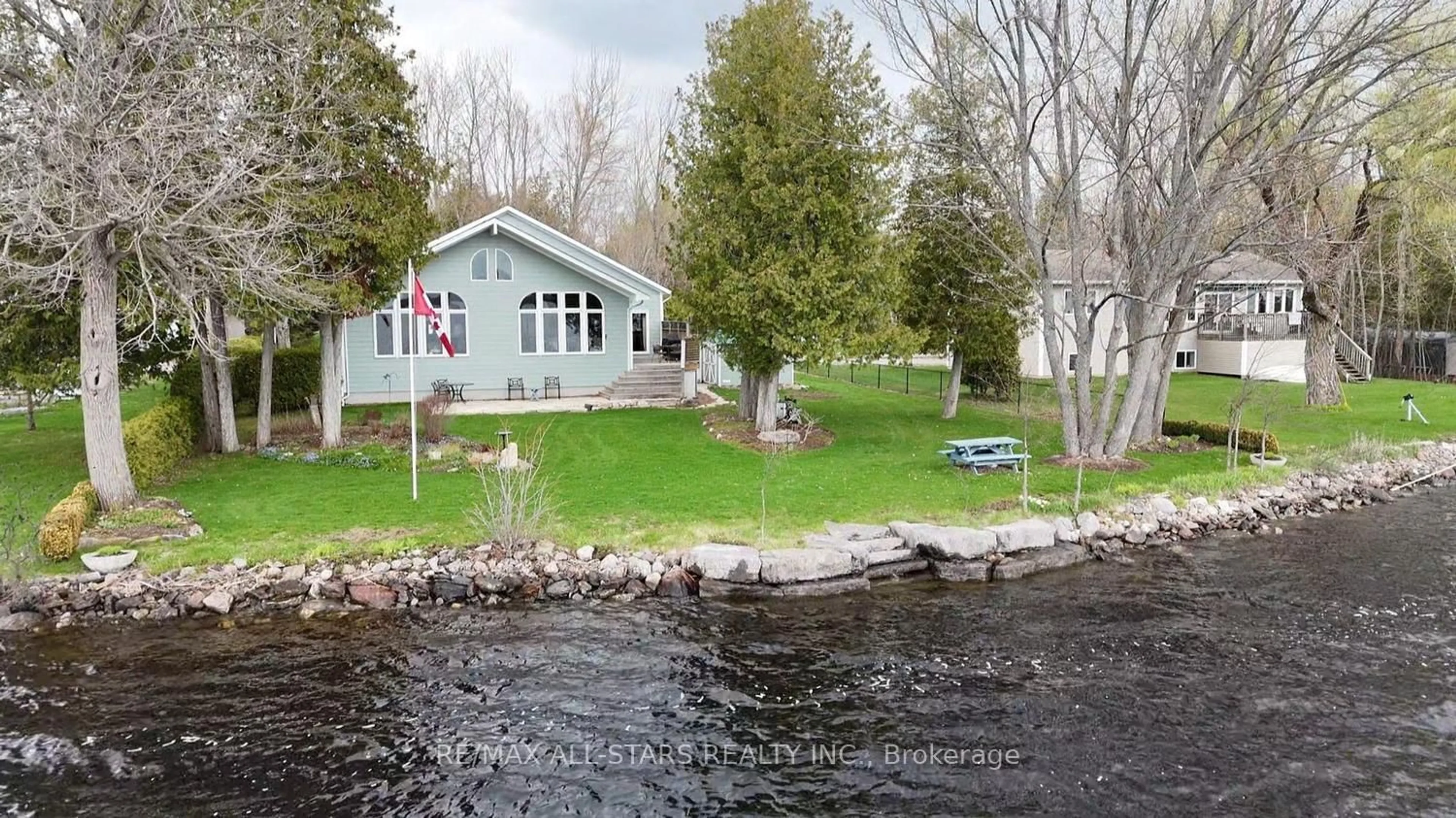 A pic from outside/outdoor area/front of a property/back of a property/a pic from drone, water/lake/river/ocean view for 58 Fire Route 98, Trent Lakes Ontario K0M 1A0