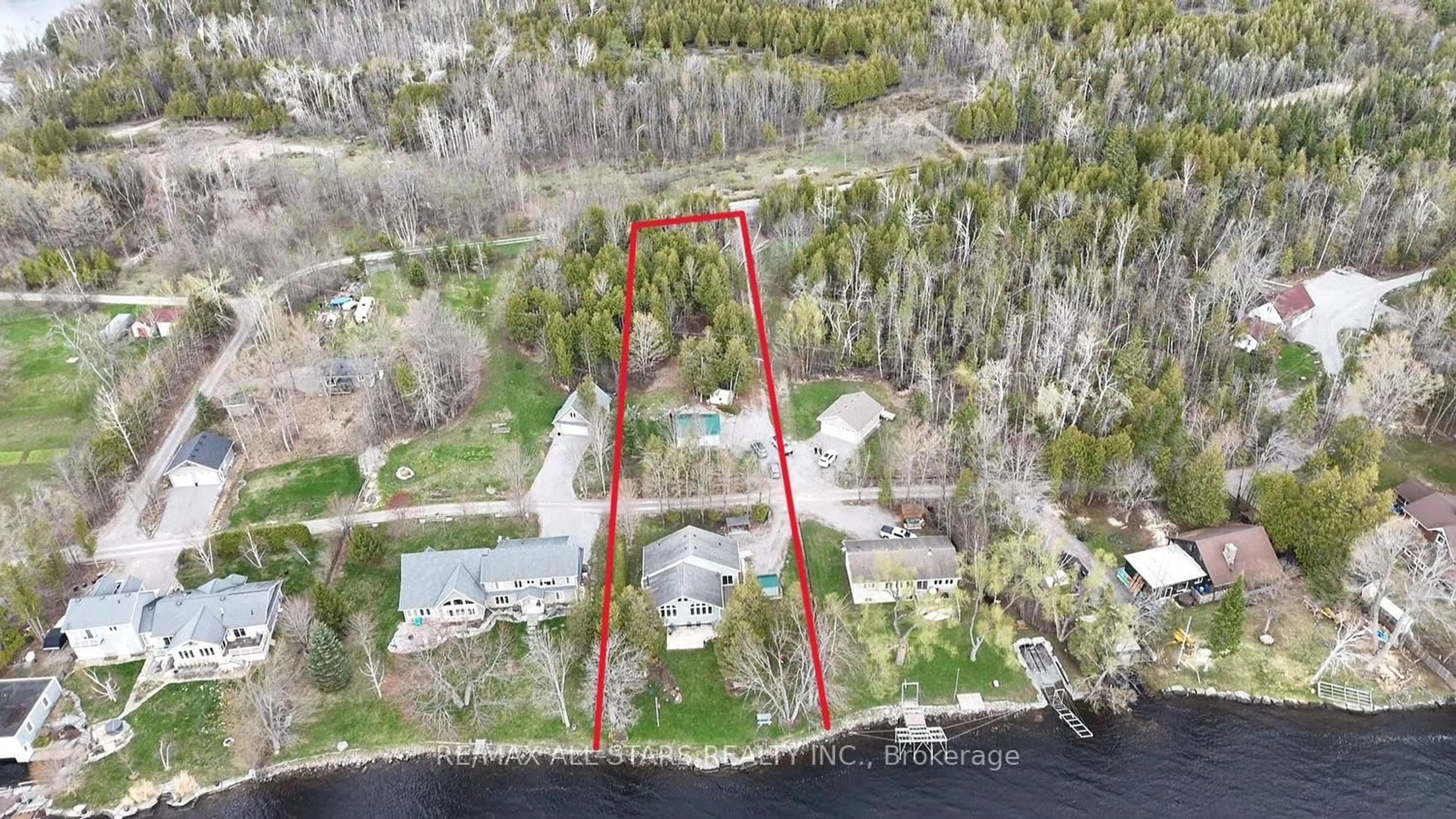 A pic from outside/outdoor area/front of a property/back of a property/a pic from drone, water/lake/river/ocean view for 58 Fire Route 98, Trent Lakes Ontario K0M 1A0