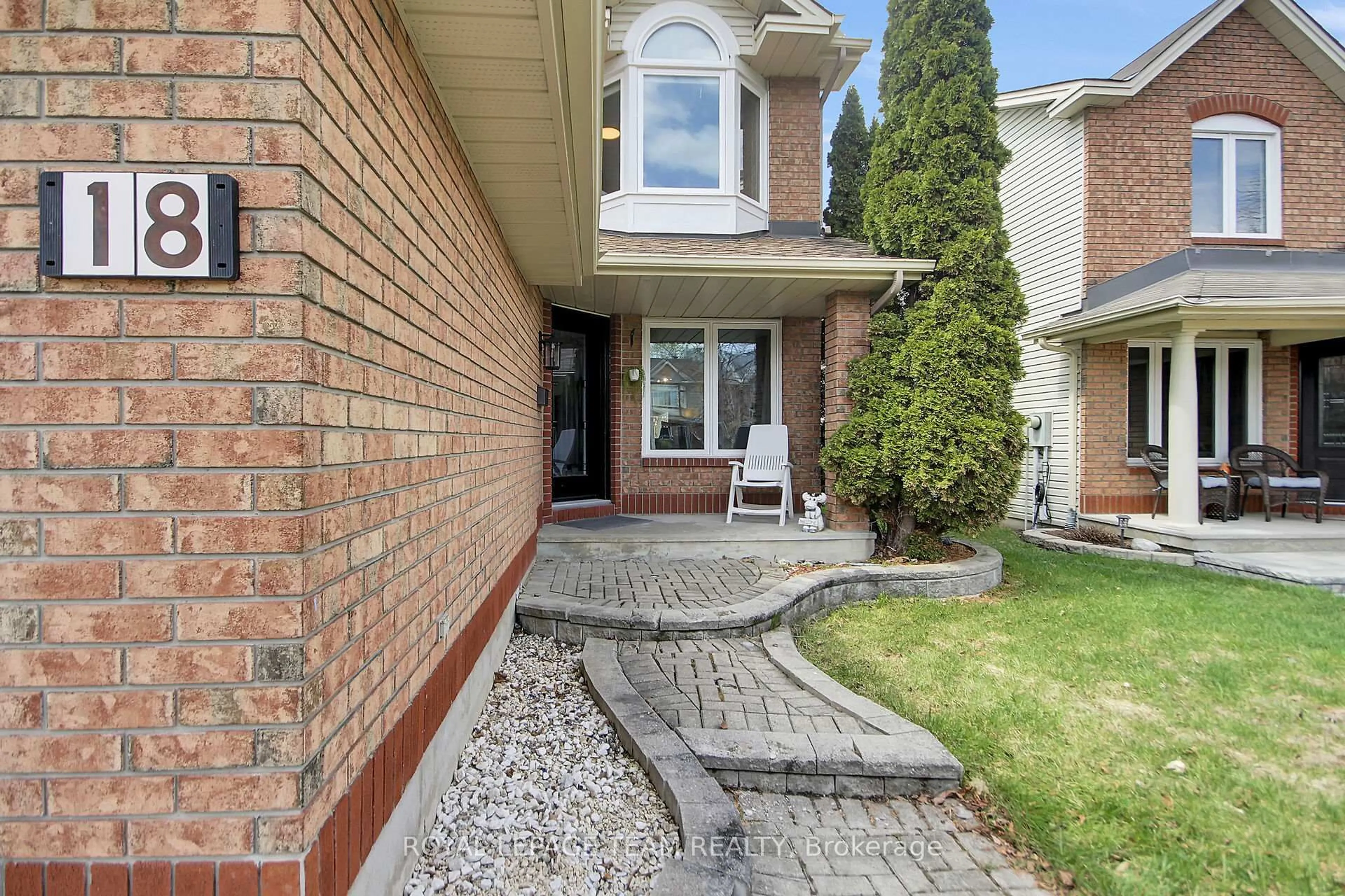 Home with brick exterior material, street for 18 Longshire Circ, Ottawa Ontario K2J 4K7
