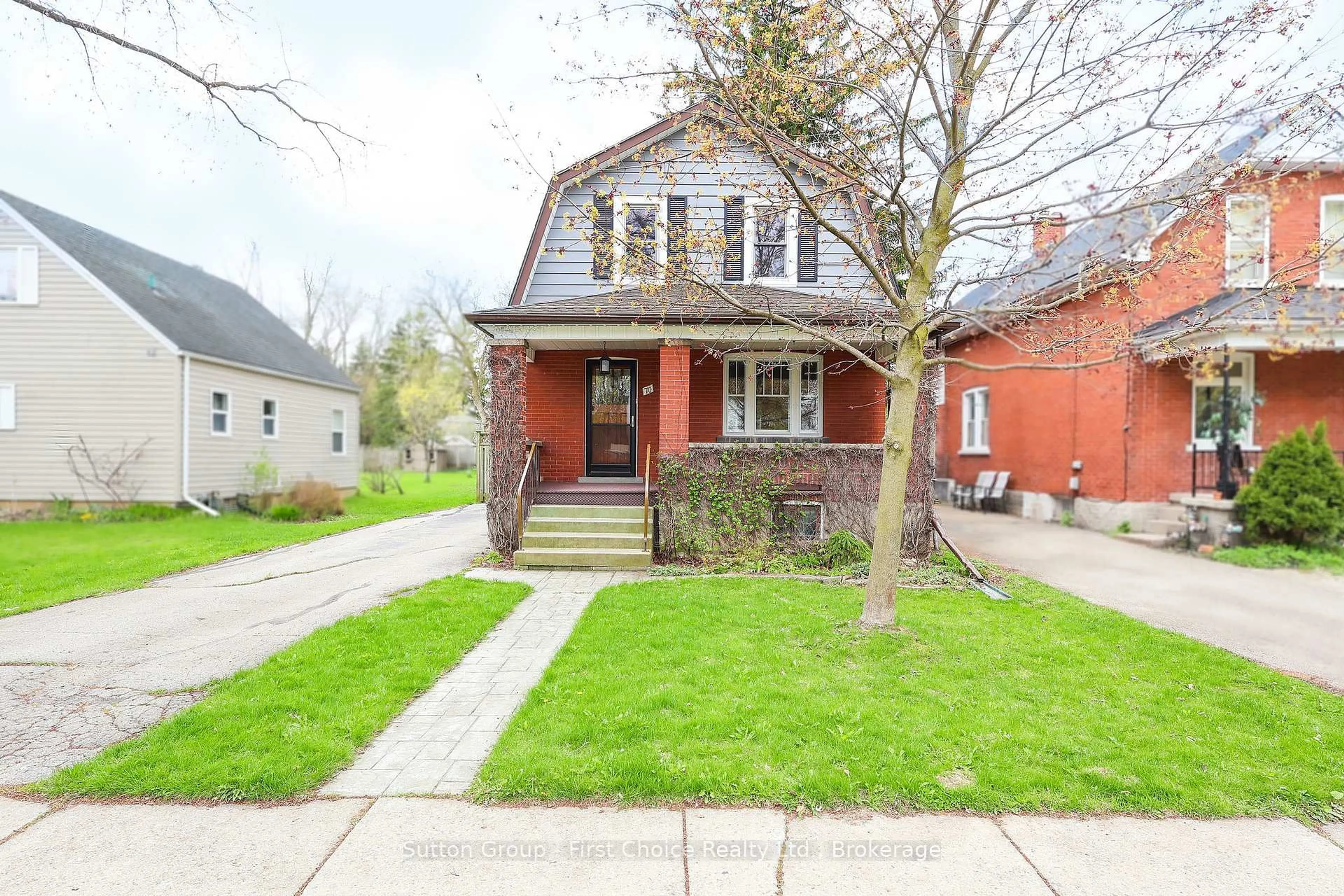 Home with brick exterior material, street for 70 Mc Nab St, Stratford Ontario N5A 1Z2