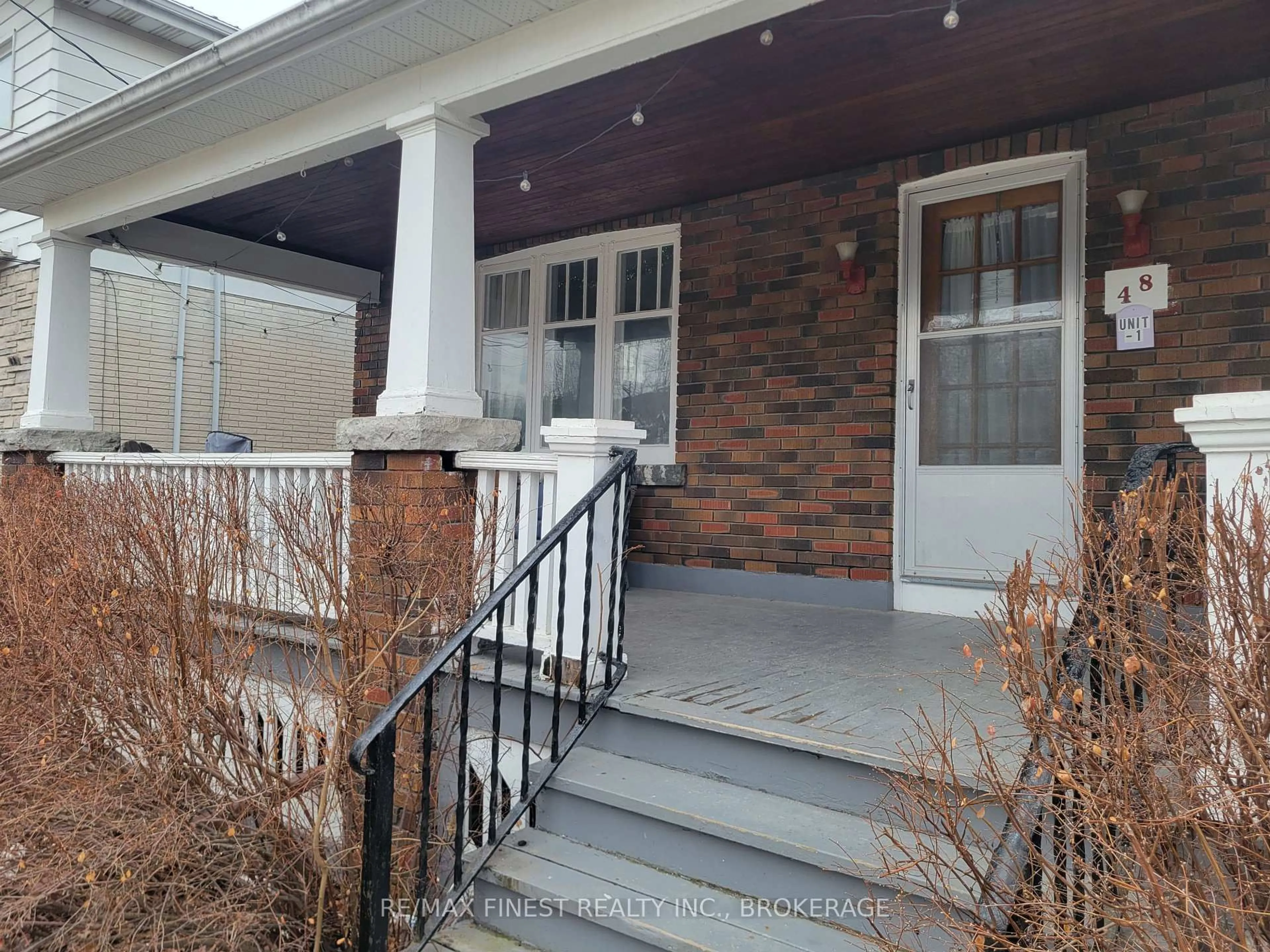 Home with brick exterior material, street for 48 Dundas St, Kingston Ontario K7L 1N3
