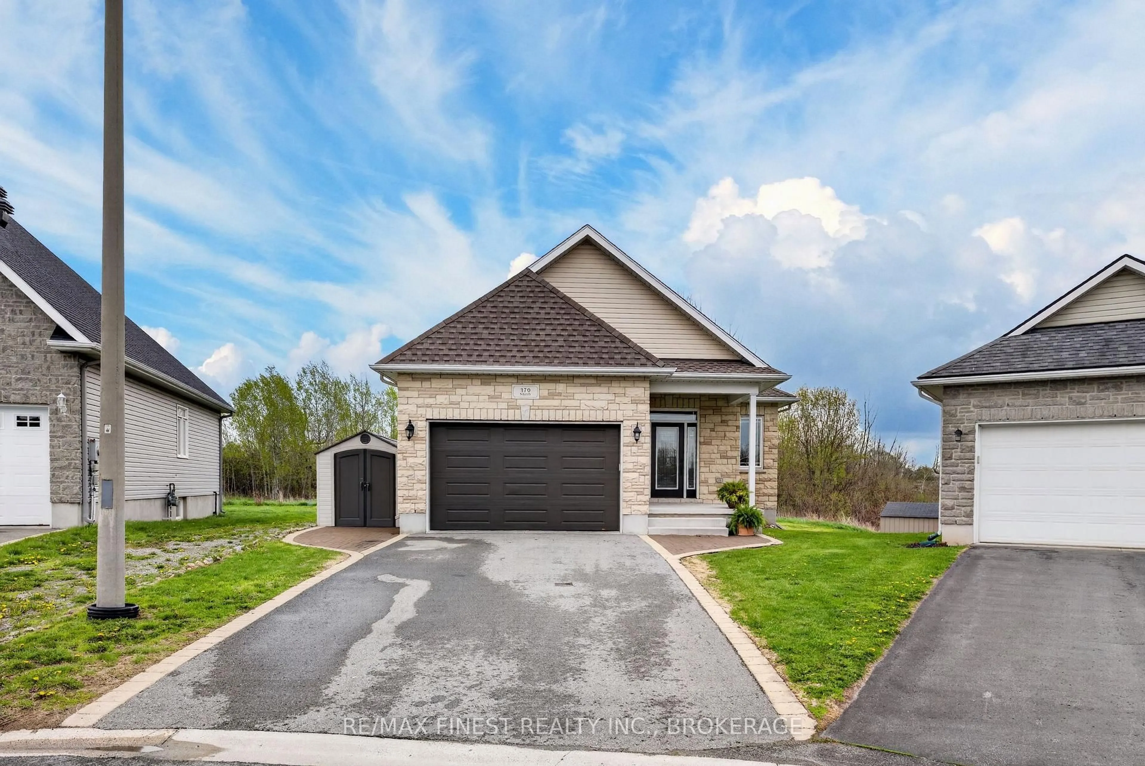 Home with brick exterior material, street for 370 Nalon Rd, Gananoque Ontario K7G 0A3