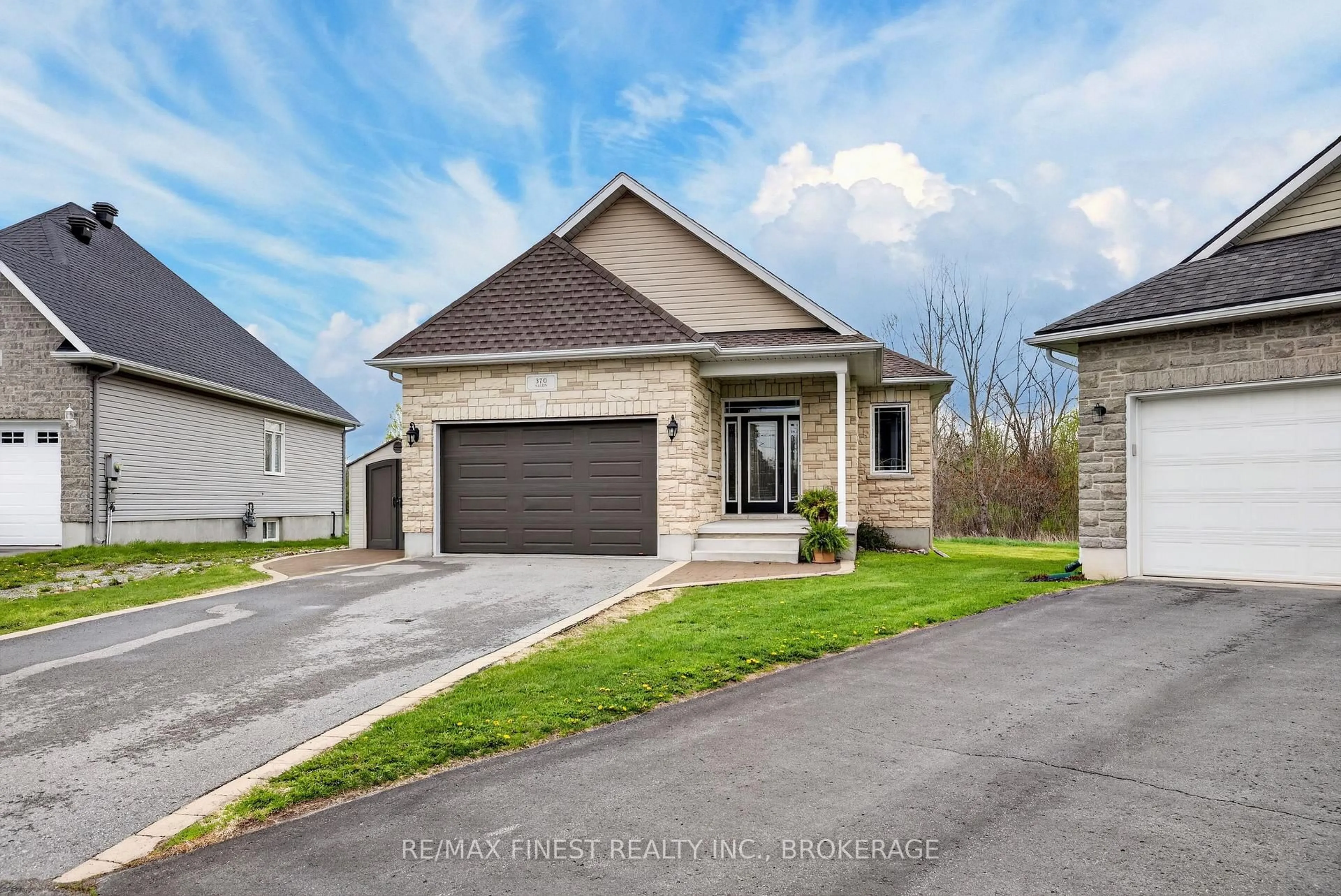 Home with brick exterior material, street for 370 Nalon Rd, Gananoque Ontario K7G 0A3