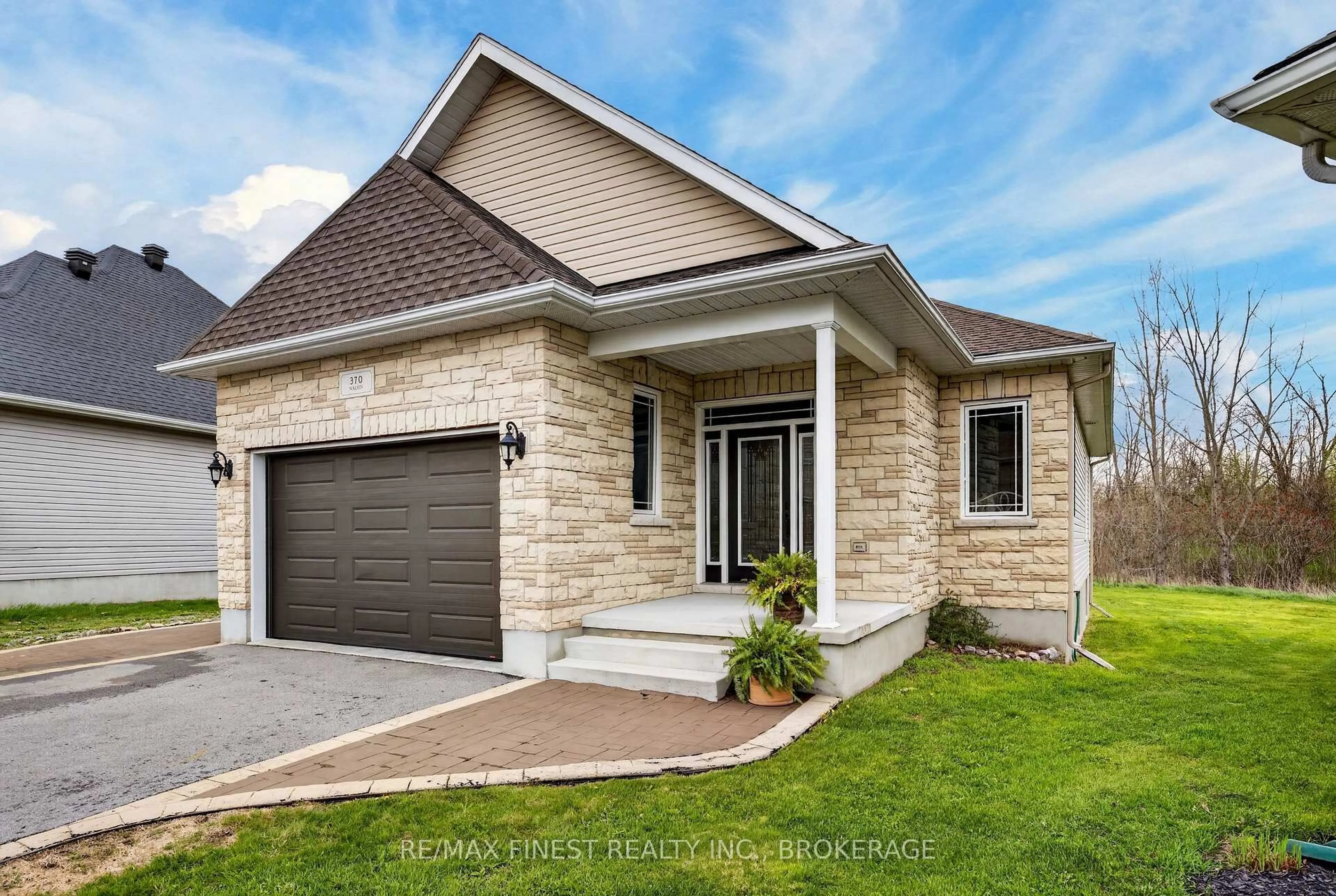 Home with brick exterior material, street for 370 Nalon Rd, Gananoque Ontario K7G 0A3