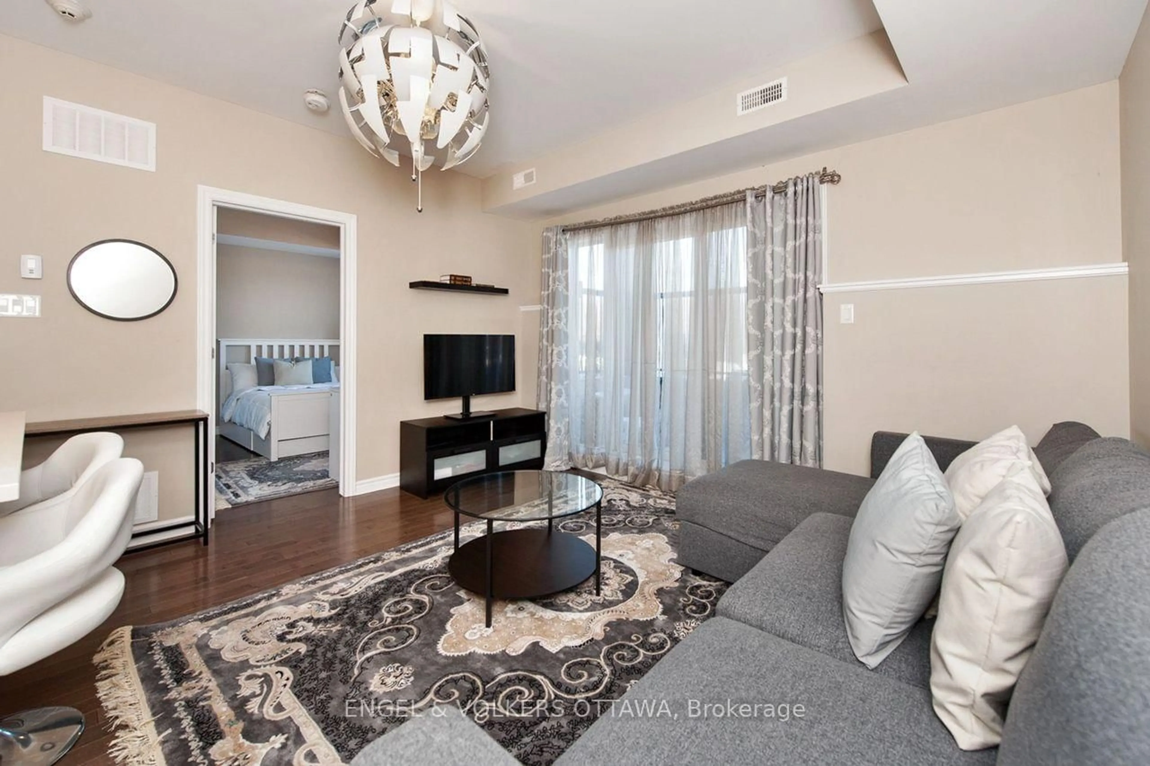 Living room with furniture, unknown for 655 Beauparc Private #103, Ottawa Ontario K1J 0B6