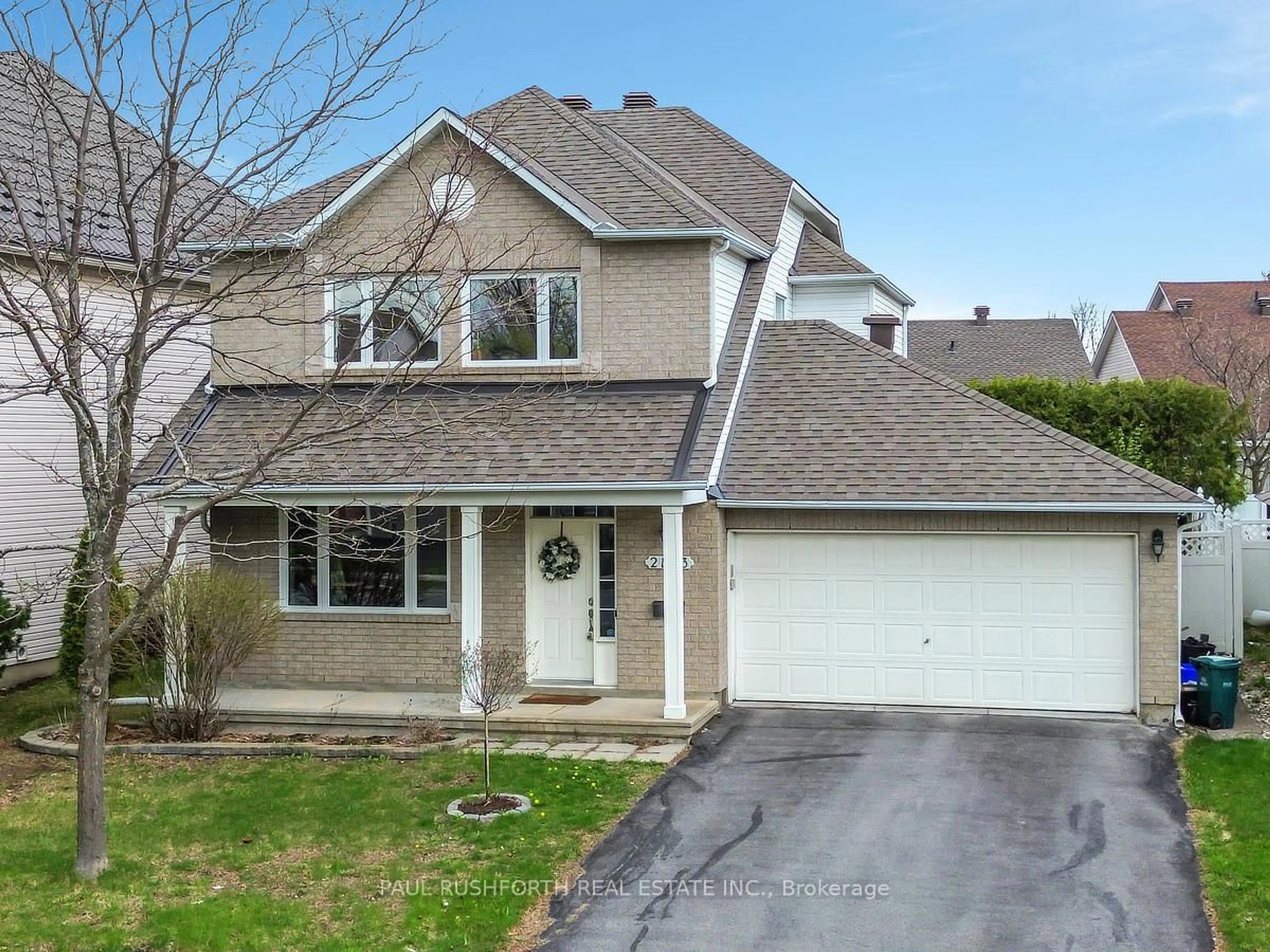 Home with vinyl exterior material, street for 2123 Esprit Dr, Orleans Ontario K4A 4K2