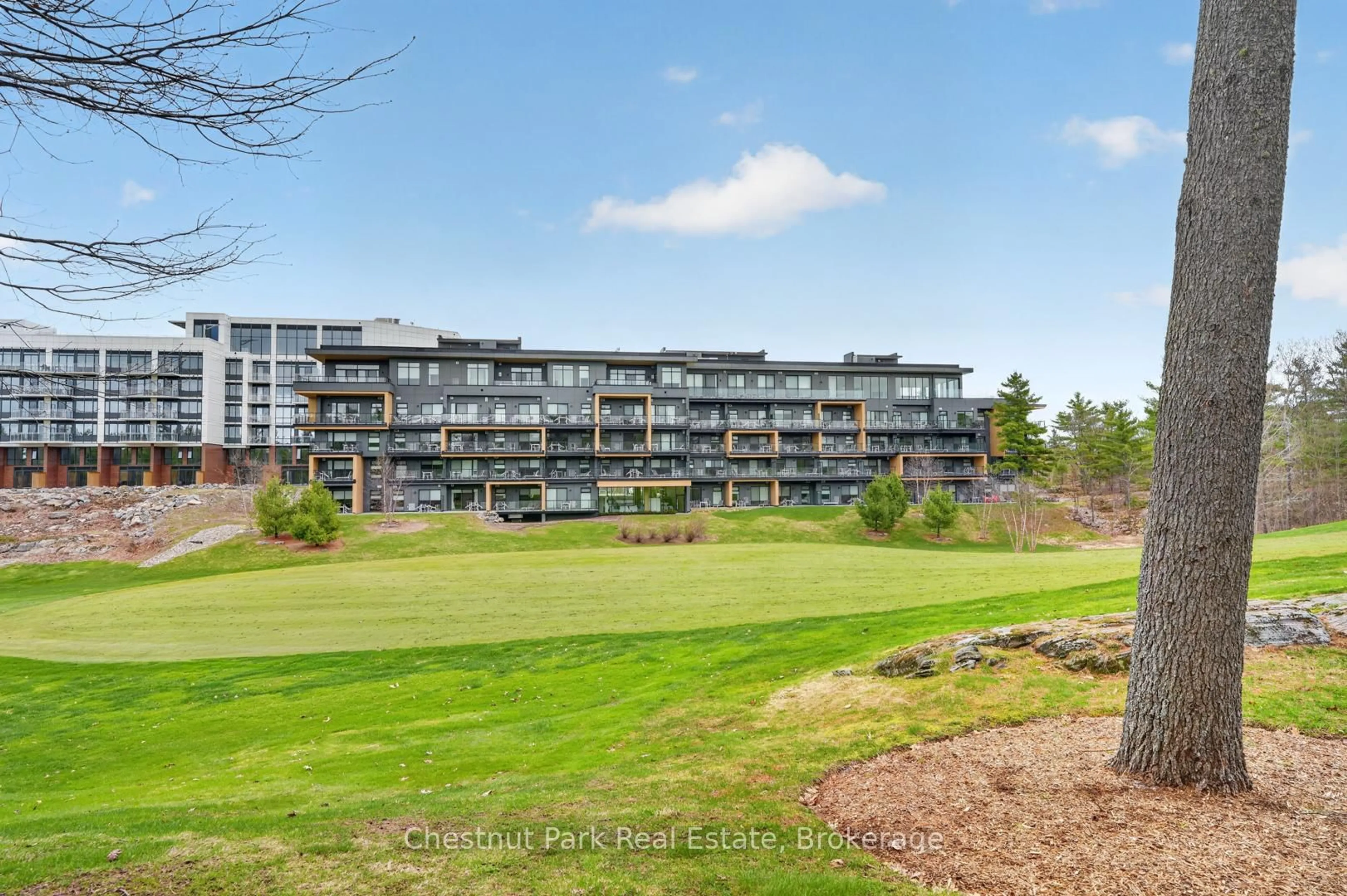 A pic from outside/outdoor area/front of a property/back of a property/a pic from drone, water/lake/river/ocean view for 120 Carrick Tr #210, Gravenhurst Ontario P1P 0B6
