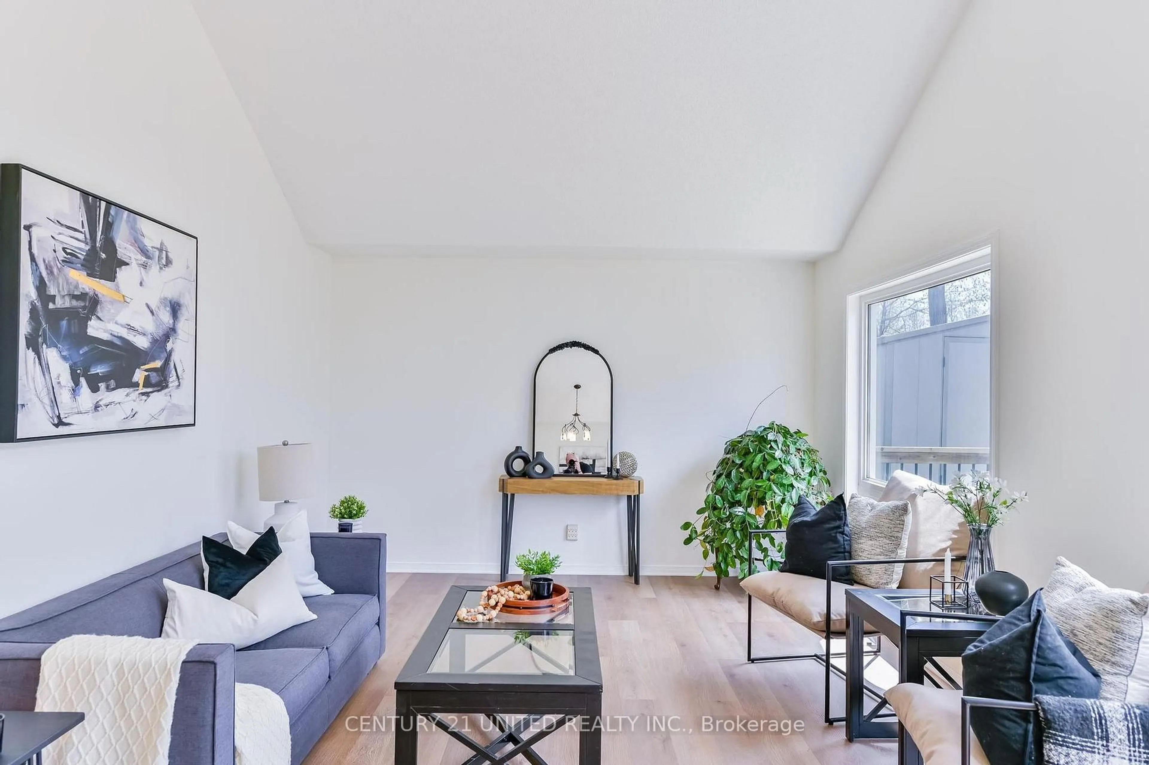 Living room with furniture, wood/laminate floor for 224 Grove Ave, Selwyn Ontario K9L 0A2