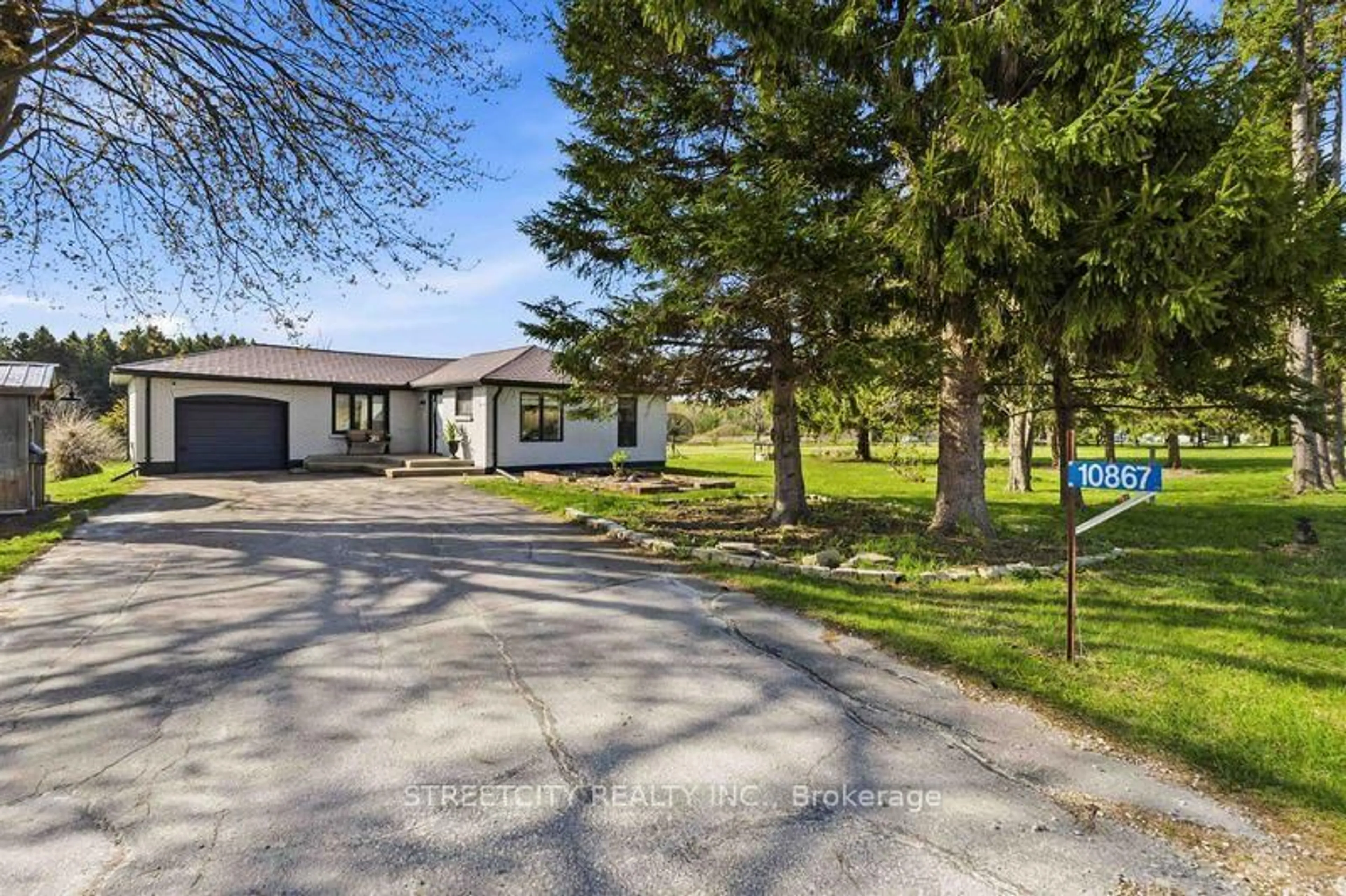 A pic from outside/outdoor area/front of a property/back of a property/a pic from drone, street for 10867 Melrose Dr, Middlesex Centre Ontario N0L 1R0