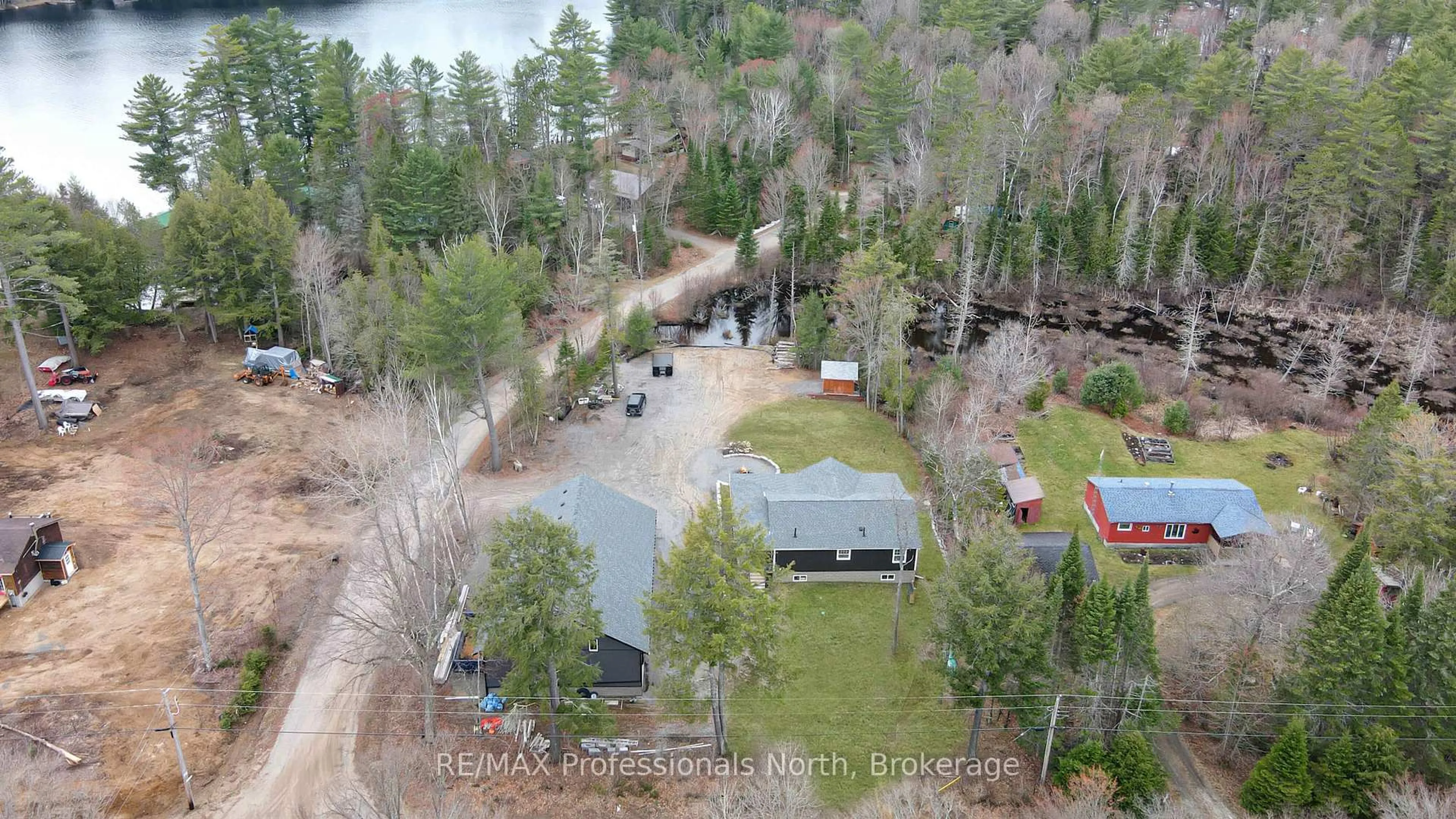 A pic from outside/outdoor area/front of a property/back of a property/a pic from drone, water/lake/river/ocean view for 1006 Jasmine Rd, Dysart et al Ontario K0L 1M1