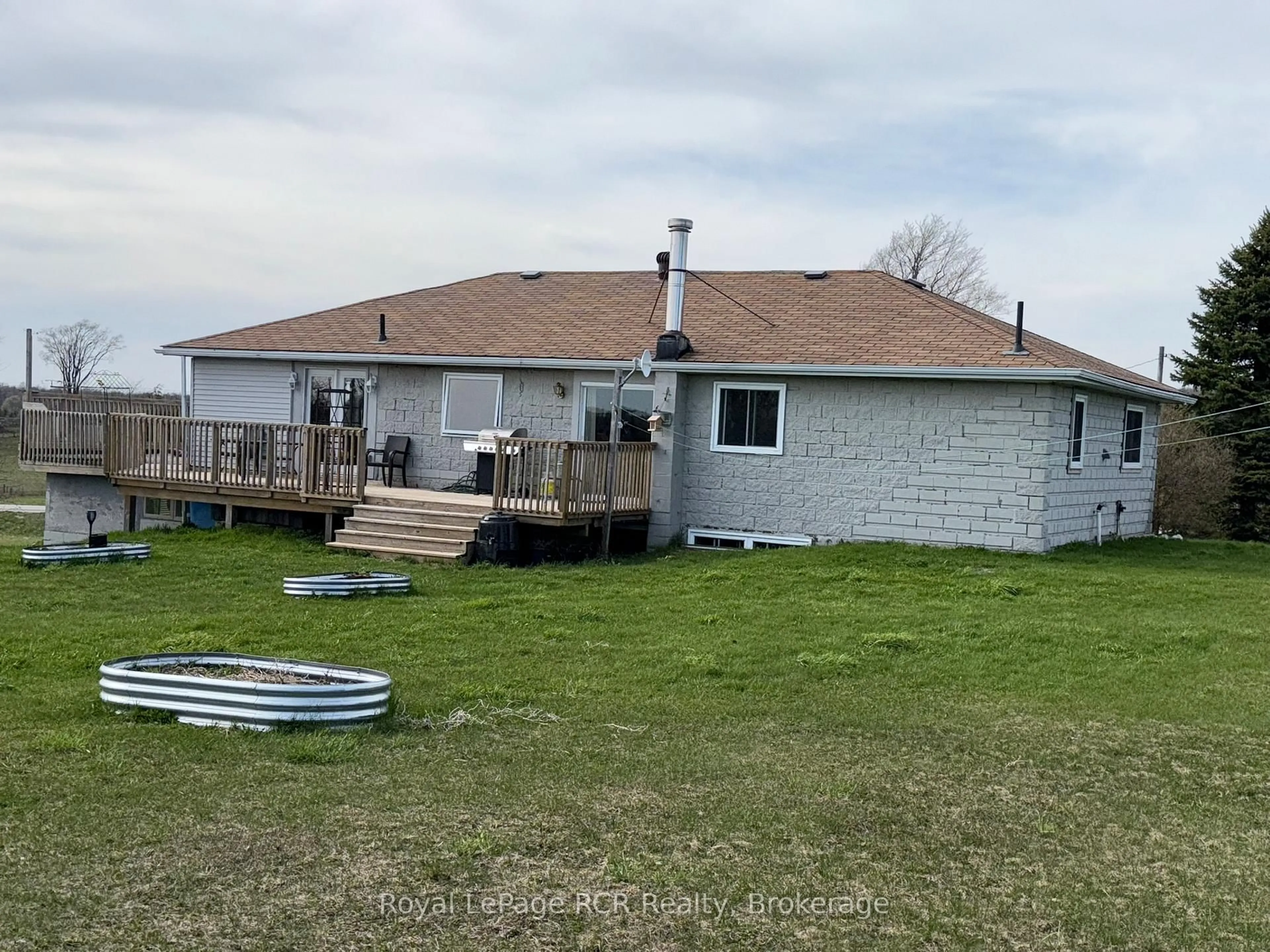 A pic from outside/outdoor area/front of a property/back of a property/a pic from drone, water/lake/river/ocean view for 385190 Concession 4A, Grey Highlands Ontario N0C 1E0