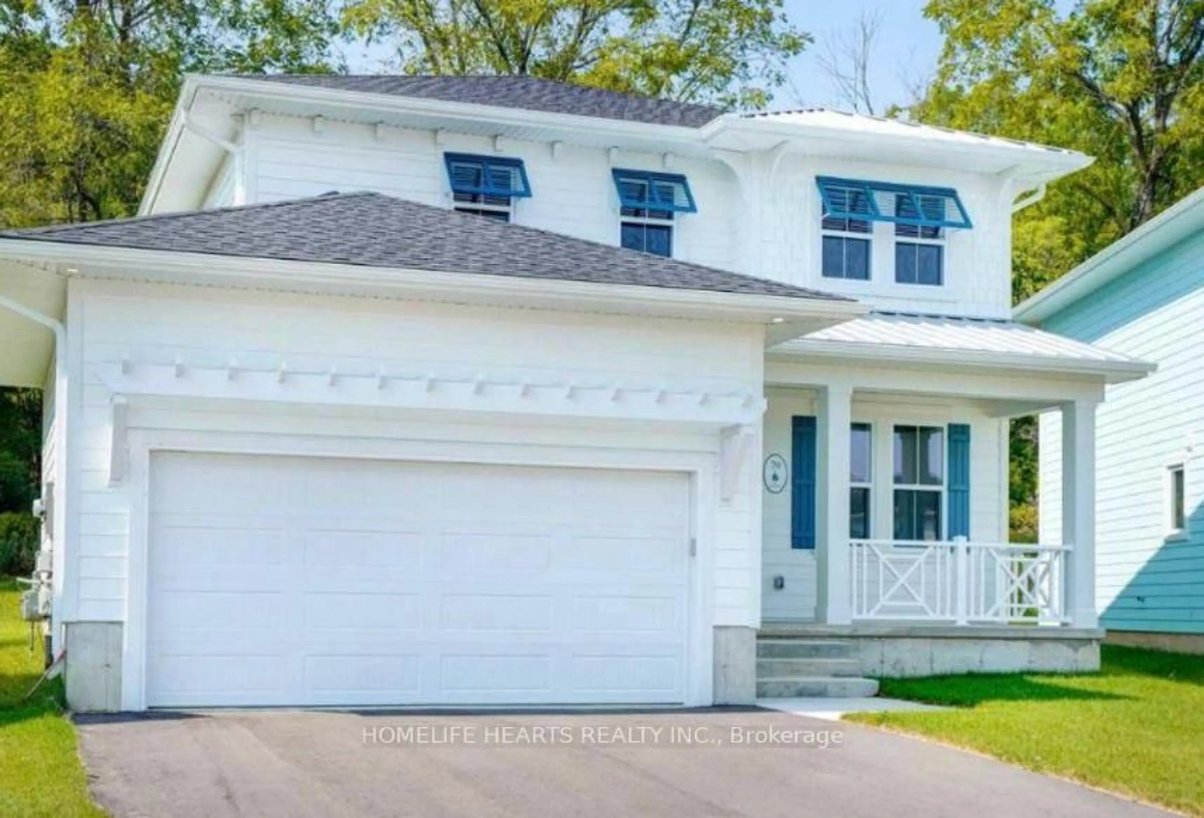 Home with vinyl exterior material, street for 70 The Promenade, Central Elgin Ontario N5L 1C5